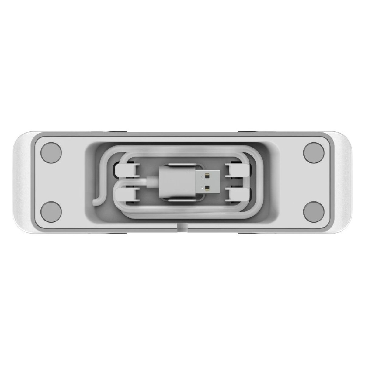 Srebrne urządzenie z portem USB w środku. Kabel USB jest zwinięty wewnątrz urządzenia.