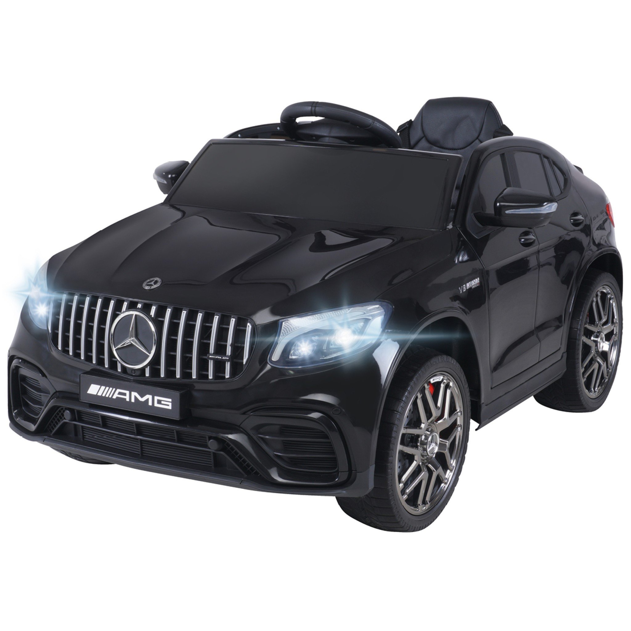 Schwarzes Mercedes-Benz AMG Spielzeugauto mit eingeschaltetem Scheinwerfer. Es ist ein kleines Modell.