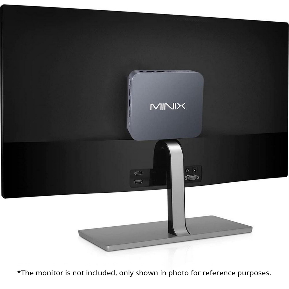 Il dispositivo multimediale MINIX è montato sul retro di un monitor. Il monitor è su un supporto argentato.