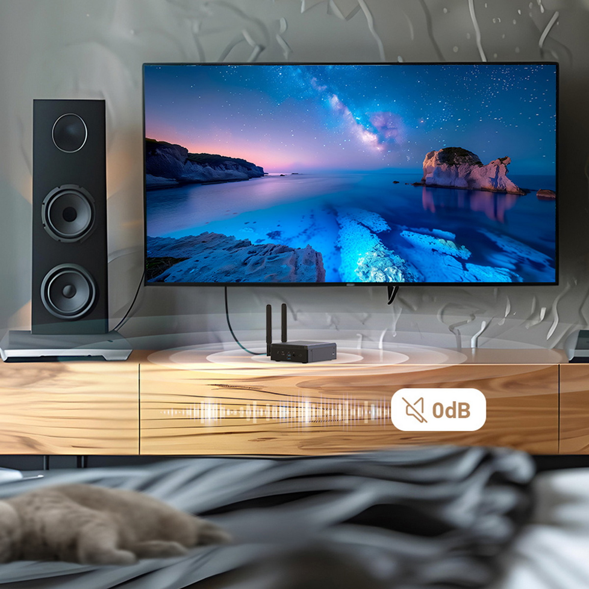 Konfiguracja salonu z telewizorem, głośnikami i mini PC, pokazująca ciche otoczenie.