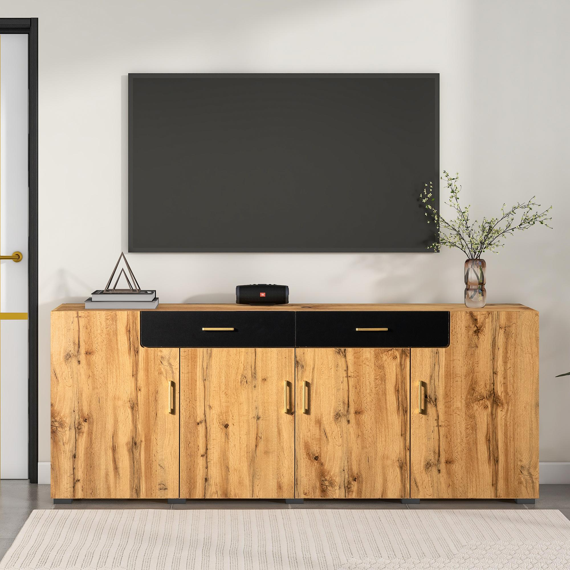 Holzschrank mit zwei Schubladen. Ein Fernseher befindet sich über dem Schrank. Eine Vase und ein Lautsprecher sind oben.