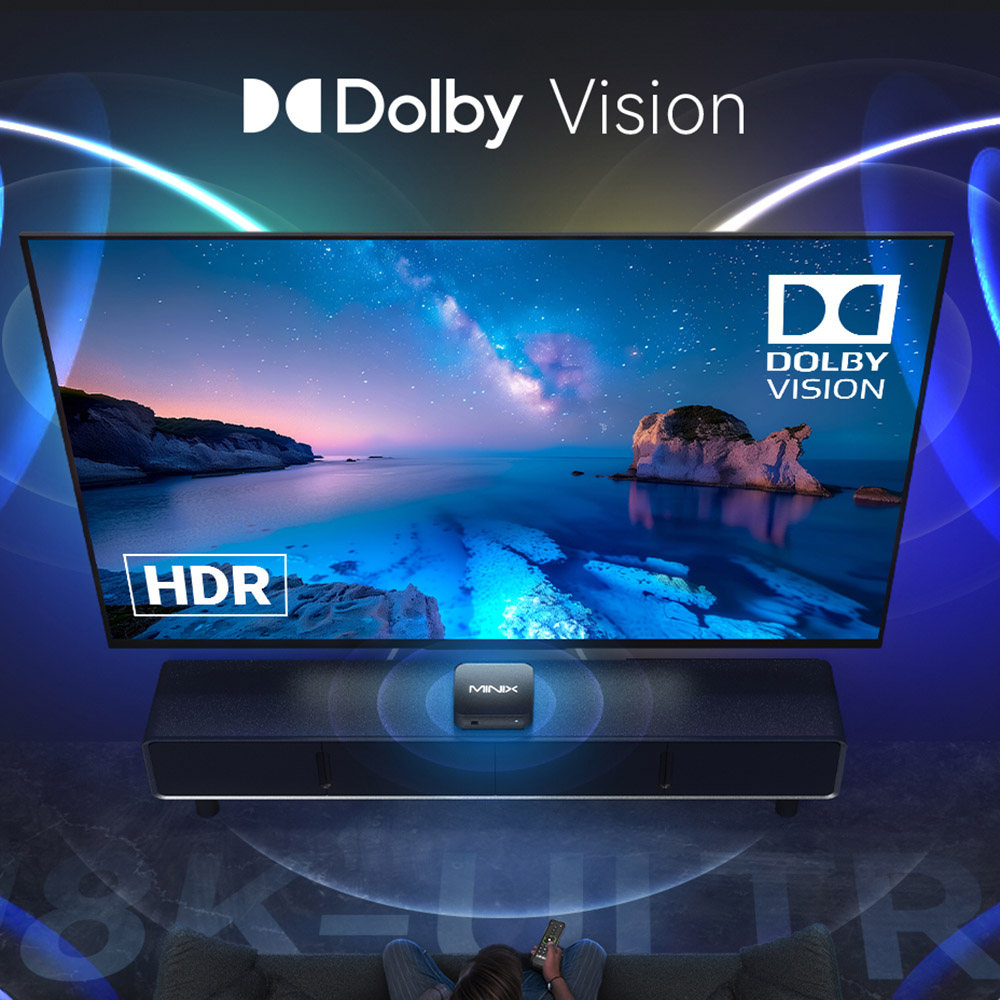 Ein Fernsehbildschirm zeigt Dolby Vision und HDR. Ein MINIX-Gerät befindet sich unter dem Fernseher.