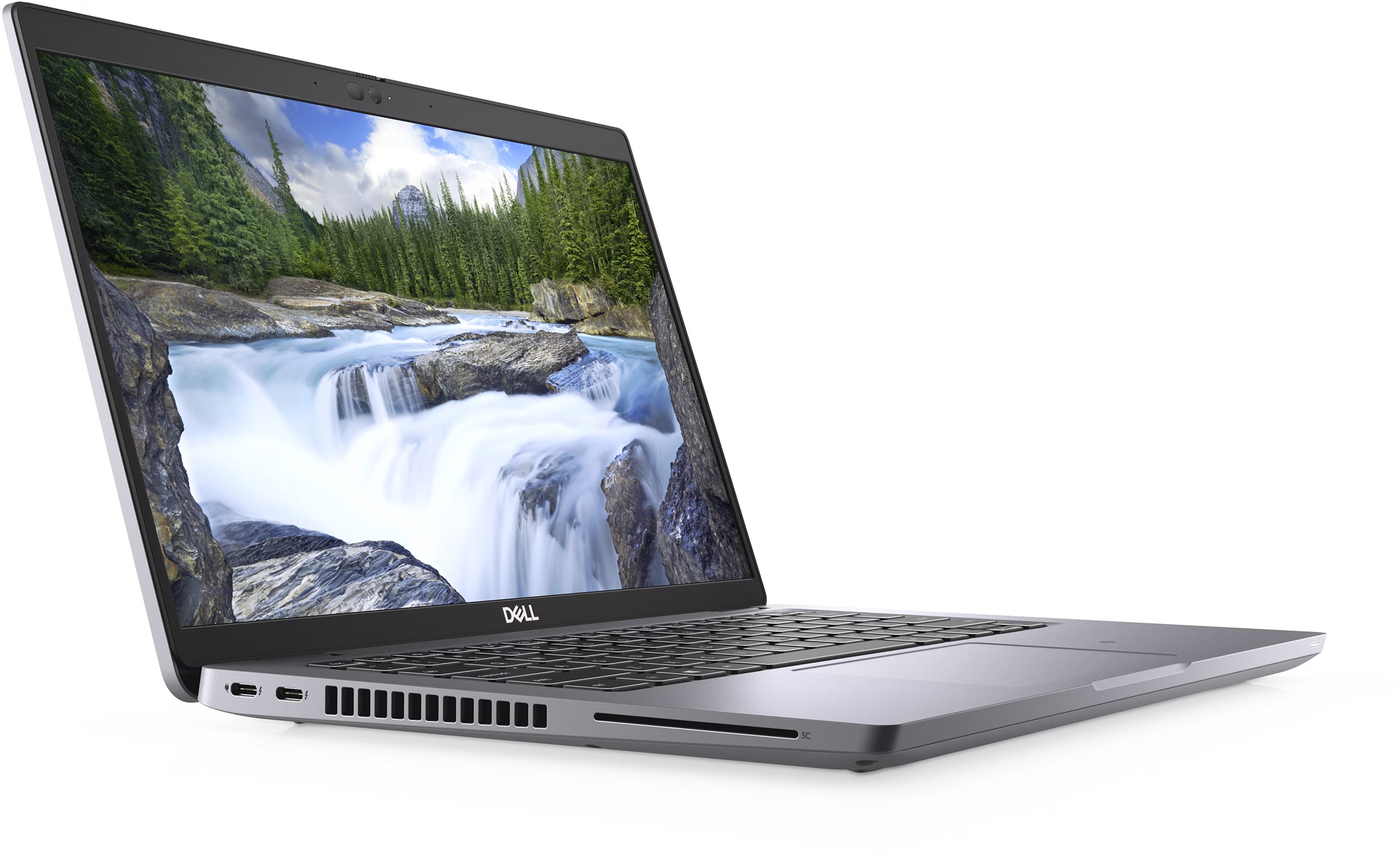 Laptop with a screen showing a waterfall in a forest. Dell logo visible, side view.