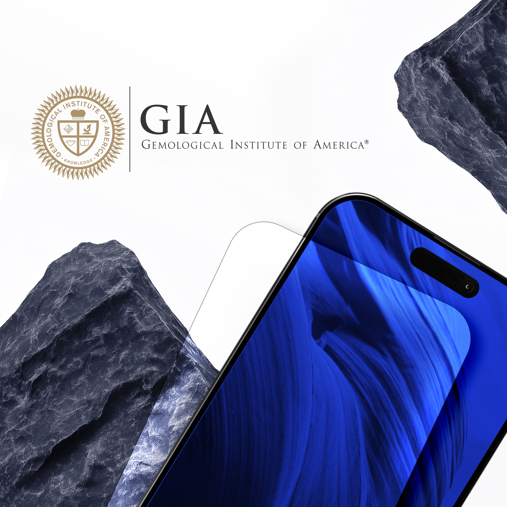 Smartfon z niebieskim ekranem. Logo GIA w tle, z kształtami przypominającymi kamienie.