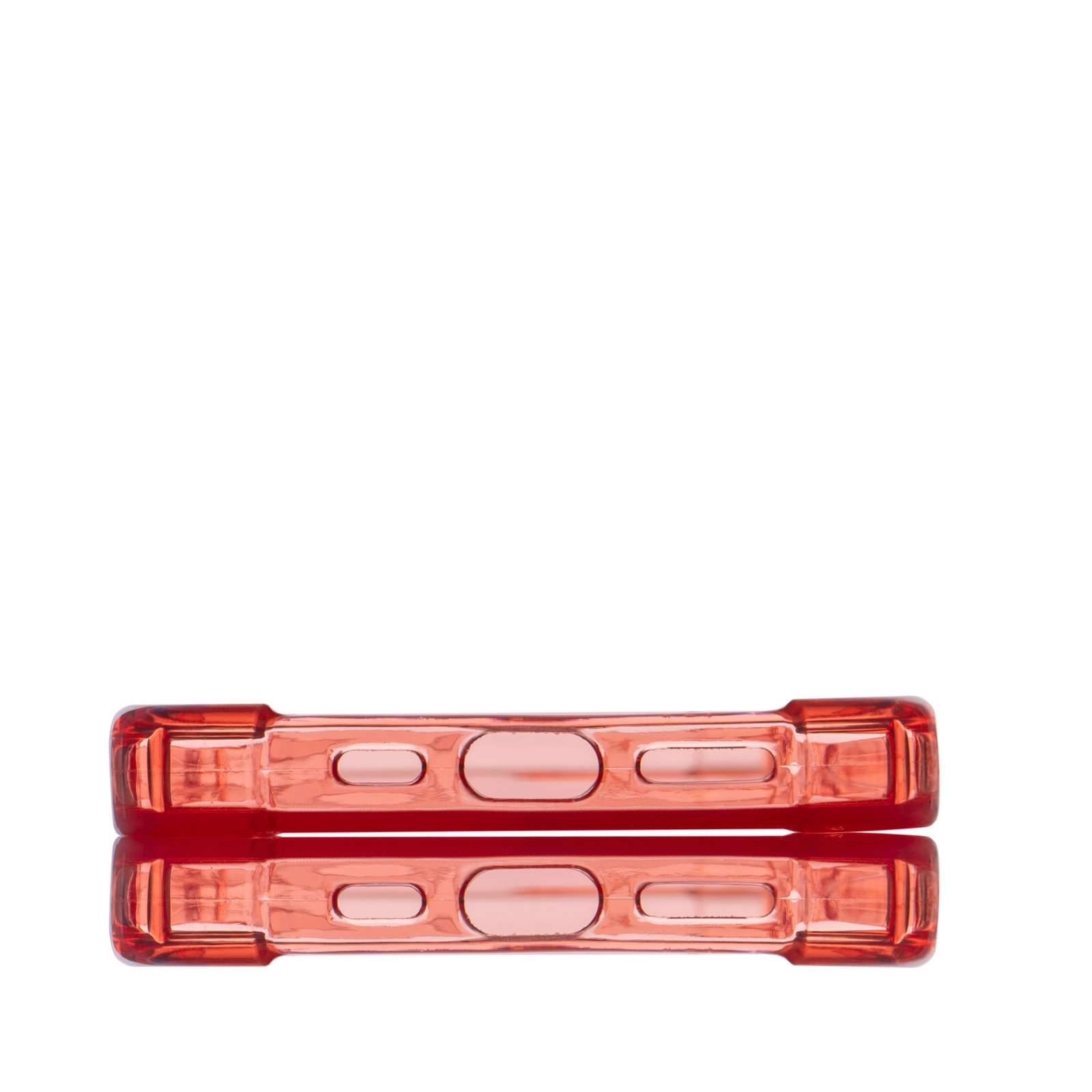 Dos mitades transparentes de funda de teléfono roja se reflejan sobre una superficie blanca.