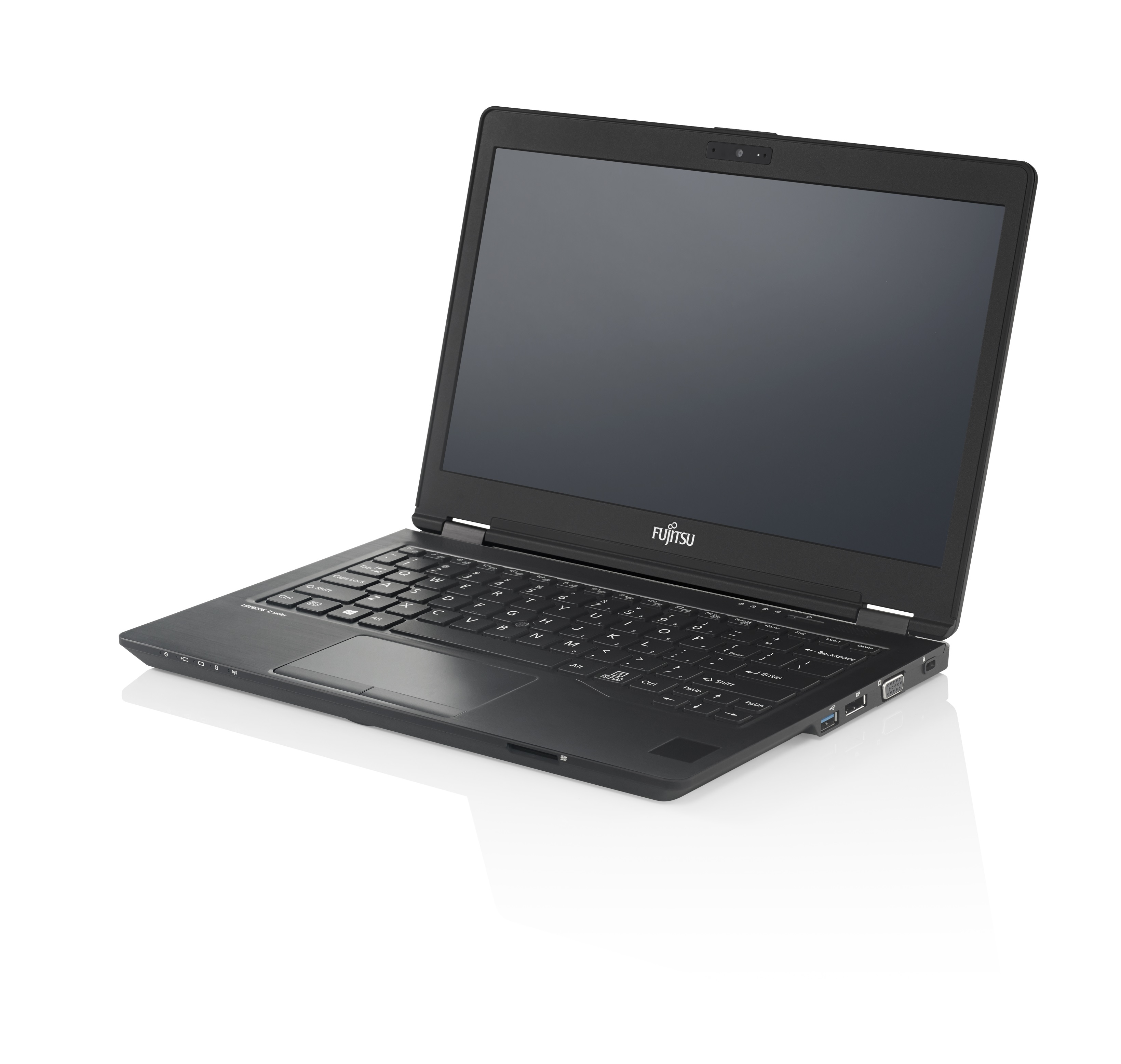 An open black laptop on a white surface, showcasing keyboard, screen, and Fujitsu logo.