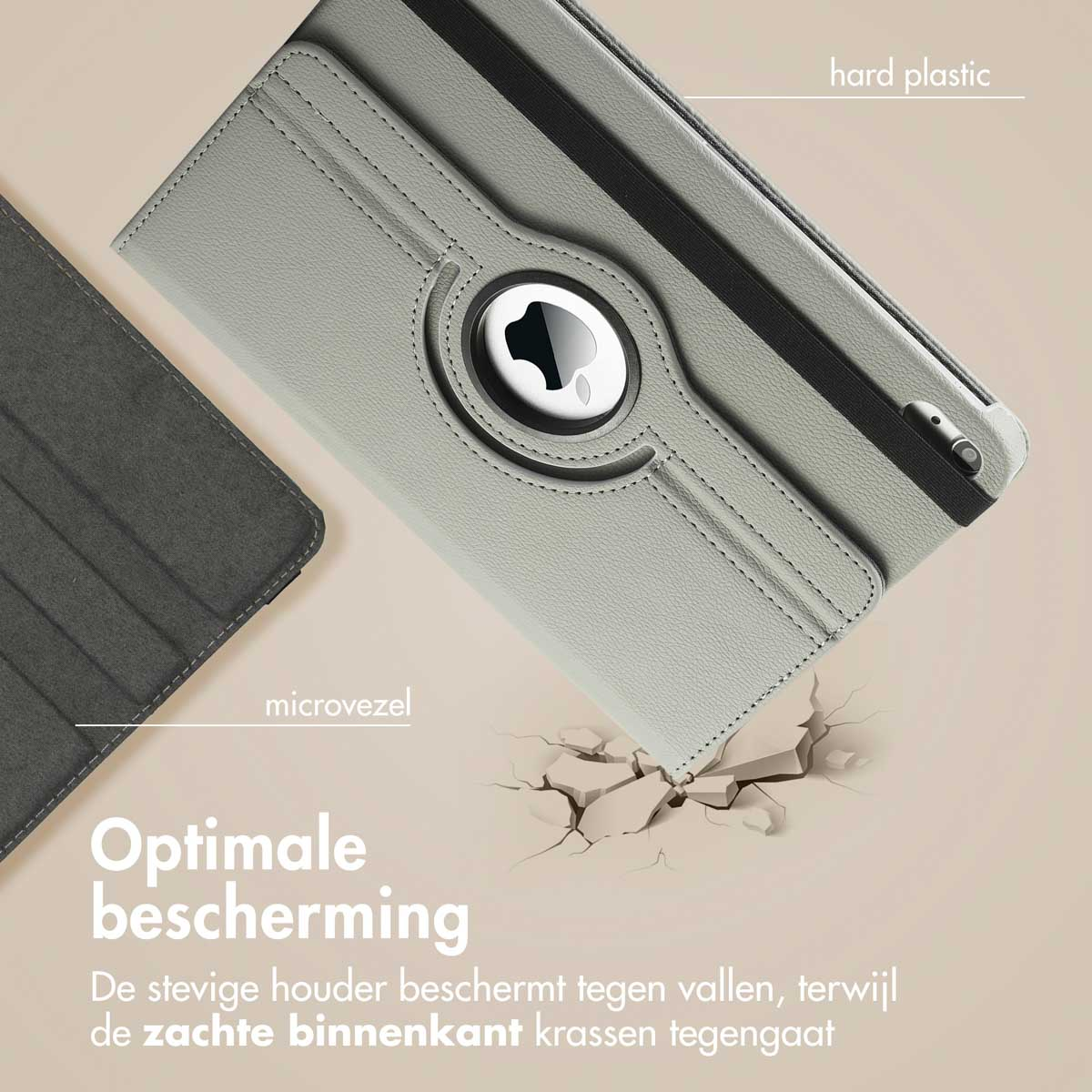 Grey tablet case with damage marks from a drop on a beige background. The case has a Apple logo cutout.