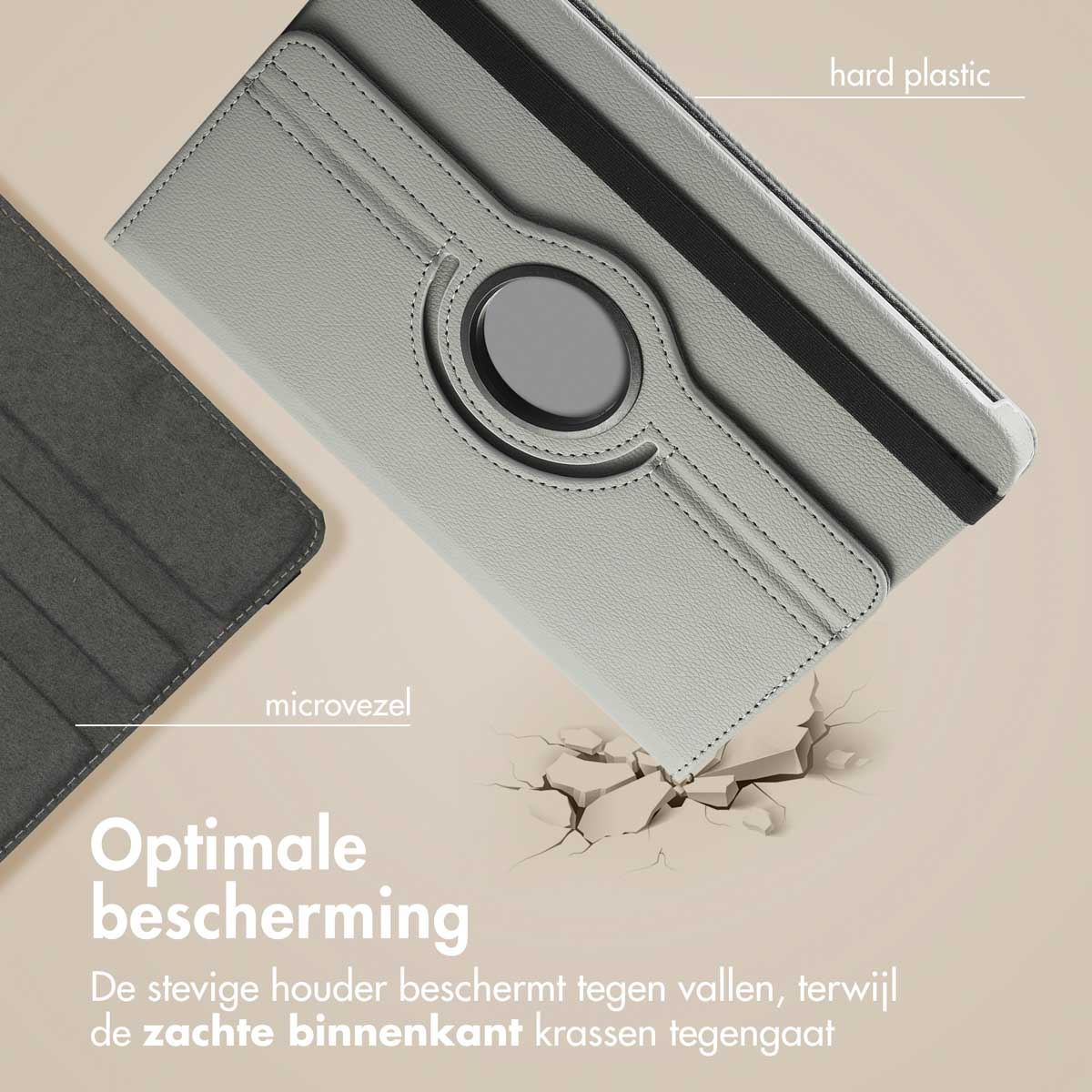 Tablet case with hard plastic and microfiber. Gray case on a white surface with cracks.