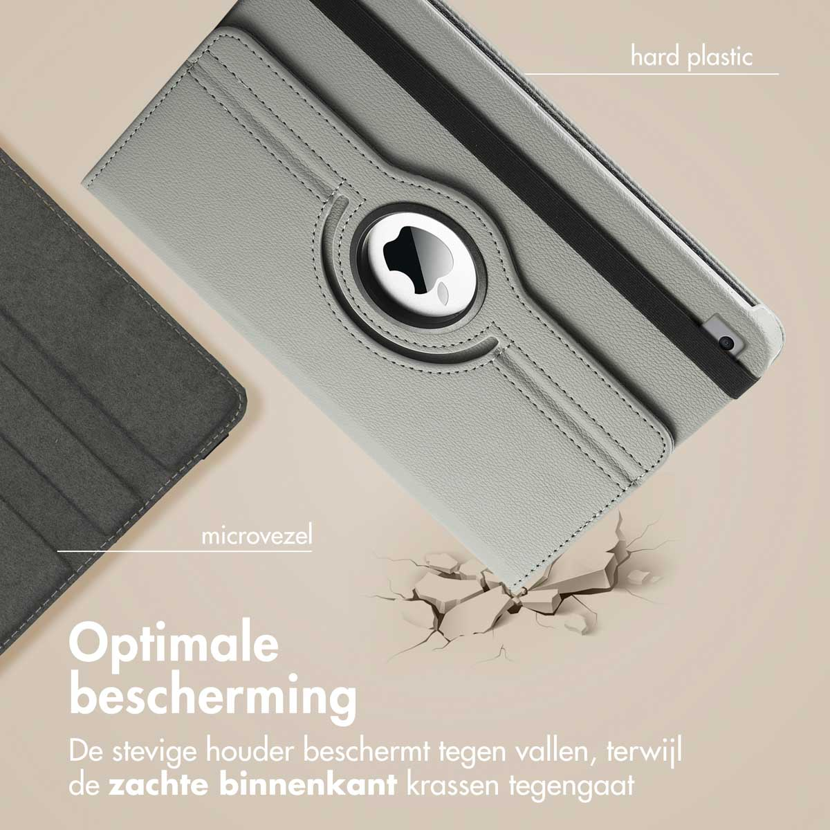 Gray tablet case with Apple logo. Text: 'microvezel', 'hard plastic', 'Optimale bescherming'. Case is on a cracked surface.
