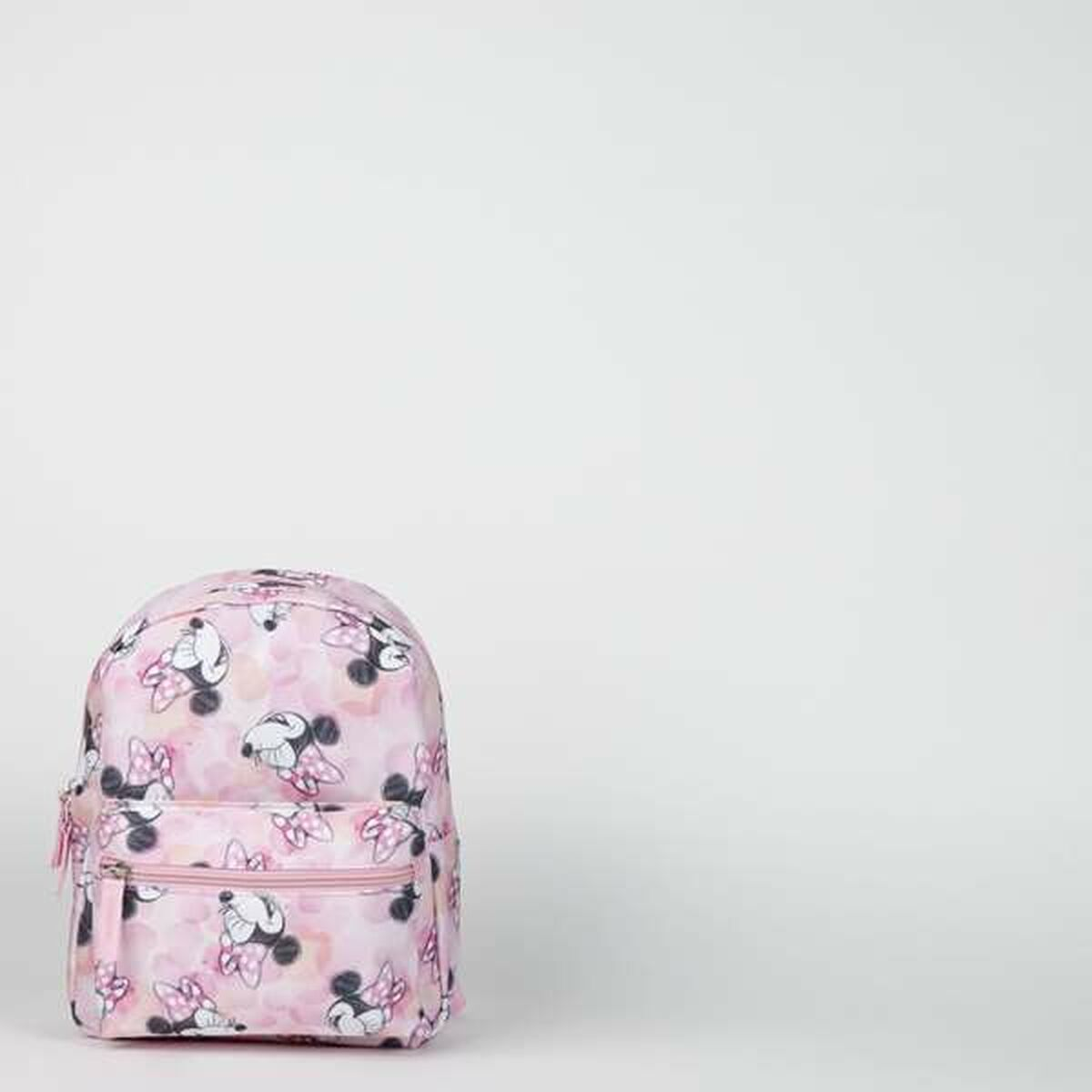 Rosa Minnie Mouse Rucksack, sich wiederholendes Design auf weißem Hintergrund. Fronttasche mit Reißverschluss.