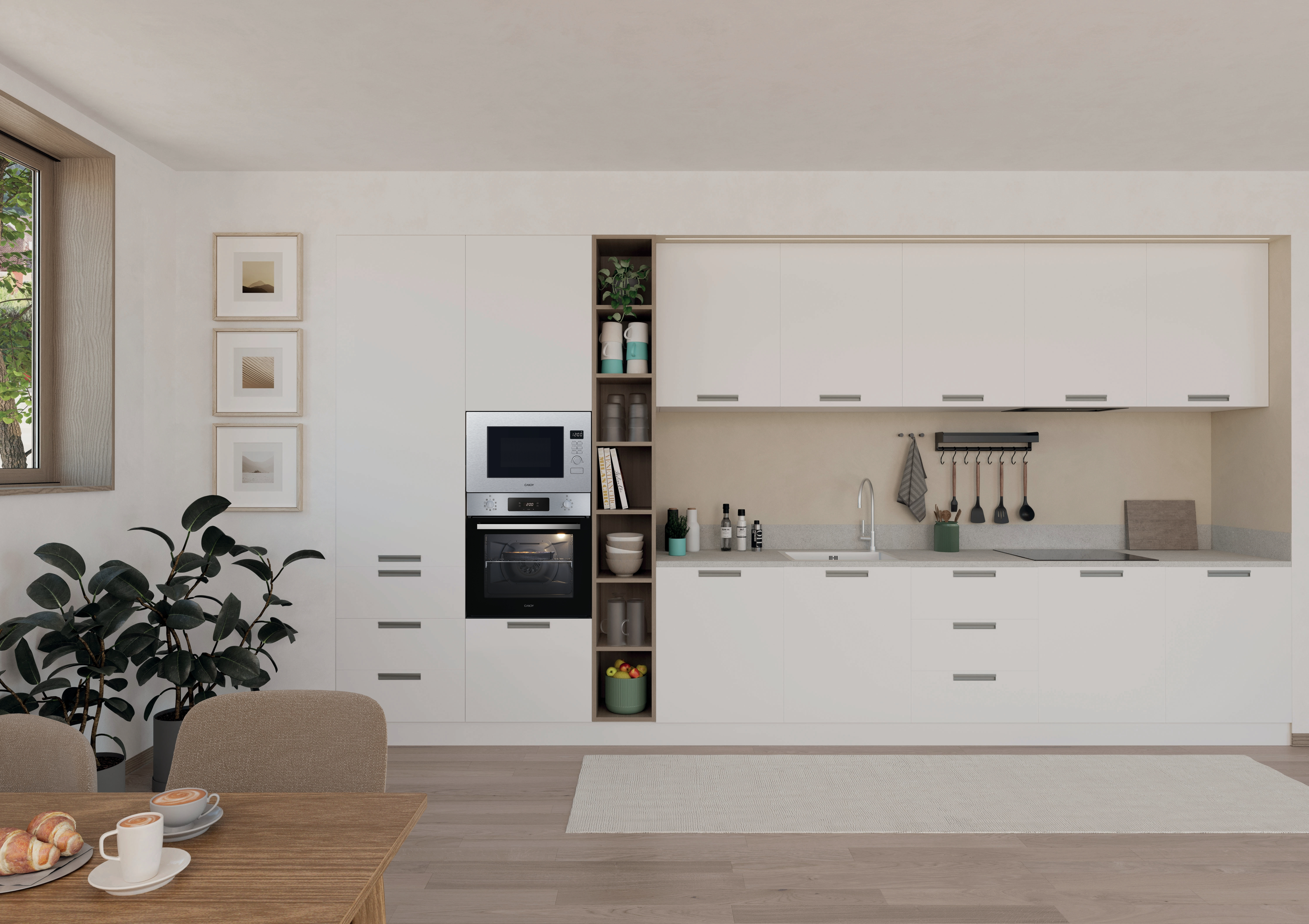 Cocina moderna con microondas empotrado en un armario. Hay algunos elementos de cocina.