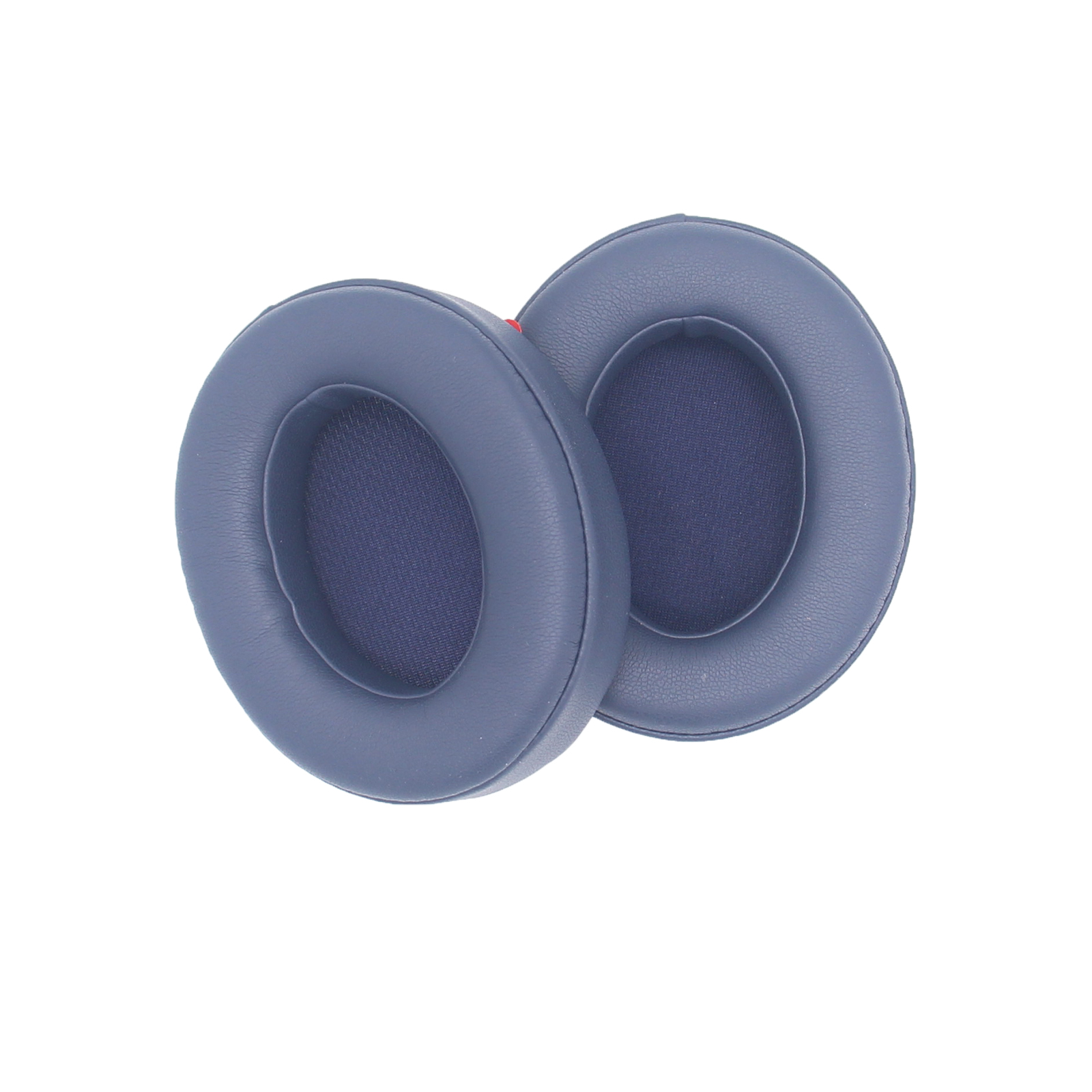 Dwie niebieskie poduszki nauszne do słuchawek na białym tle, obok siebie.