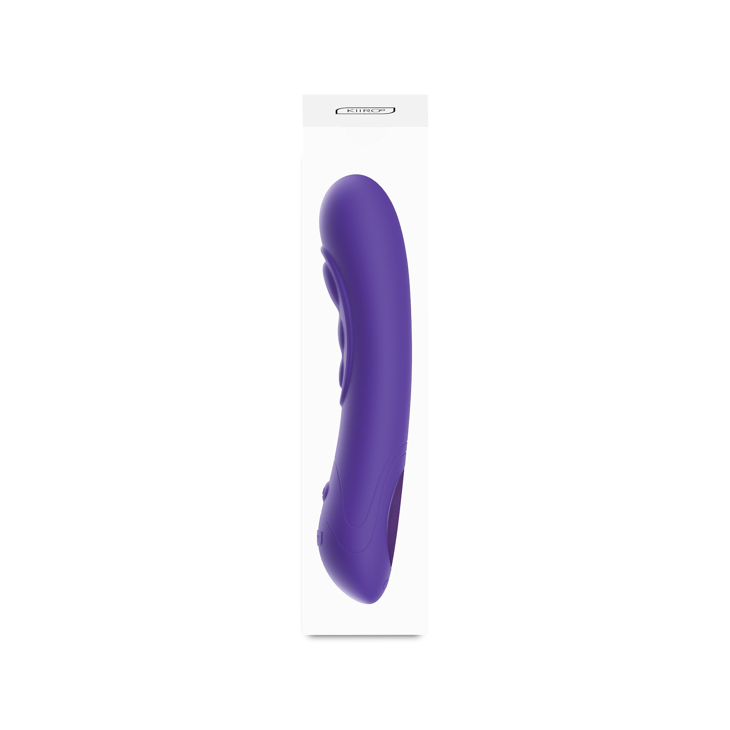 Ein lila Vibrator in einer weißen Schachtel. Die Schachtel hat Text und ein kleines Bild.