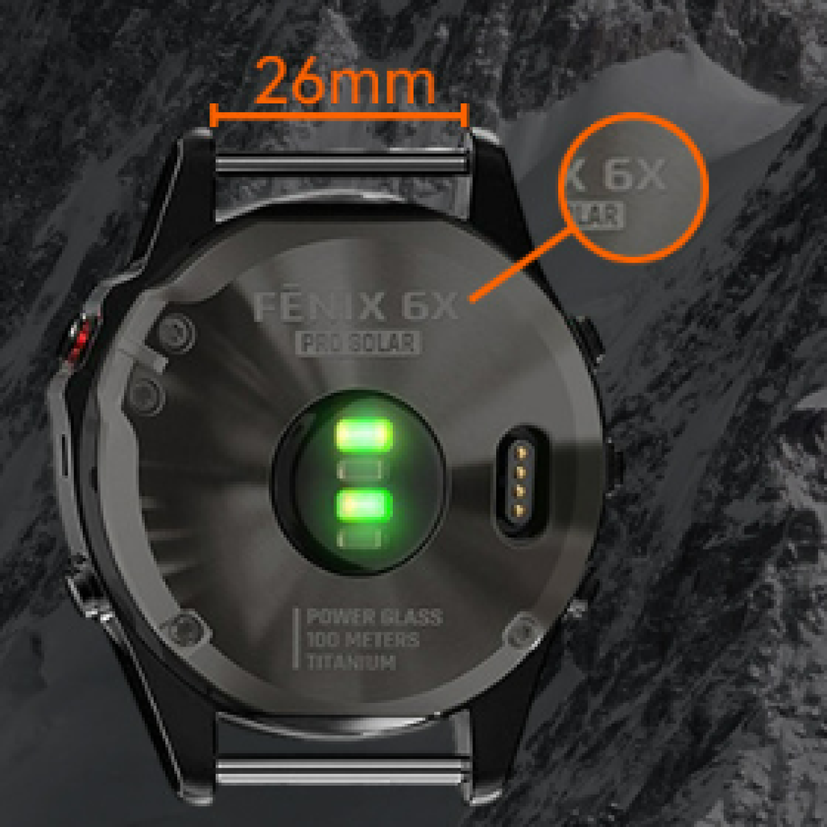 Uhr mit grünem Licht, misst 26mm. Text auf der Uhr: FENIX 6X PRO SOLAR.