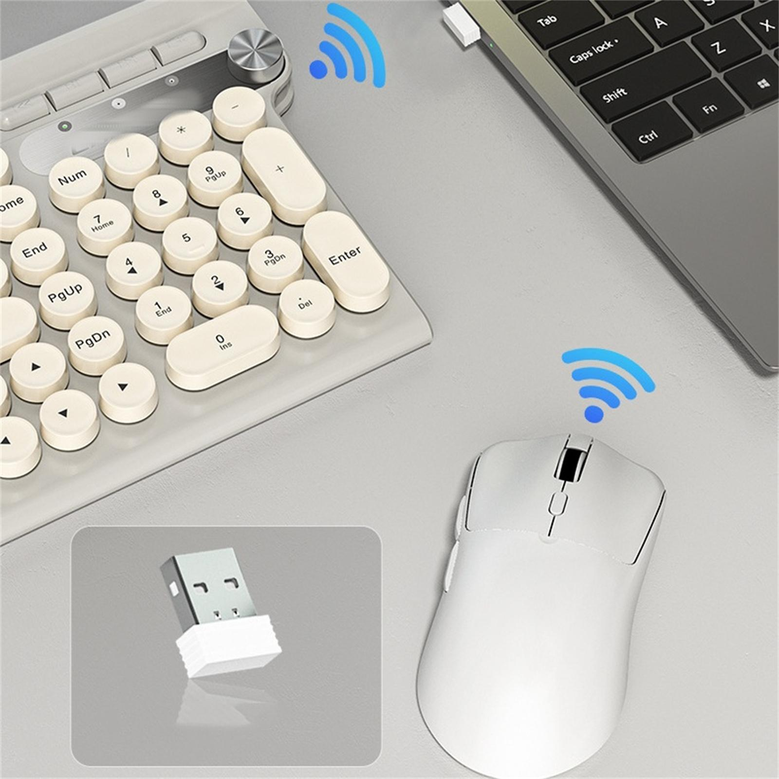 Drahtlose Tastatur und Maus. Die Tastatur hat runde Tasten. Blaues WLAN-Symbol über beiden.