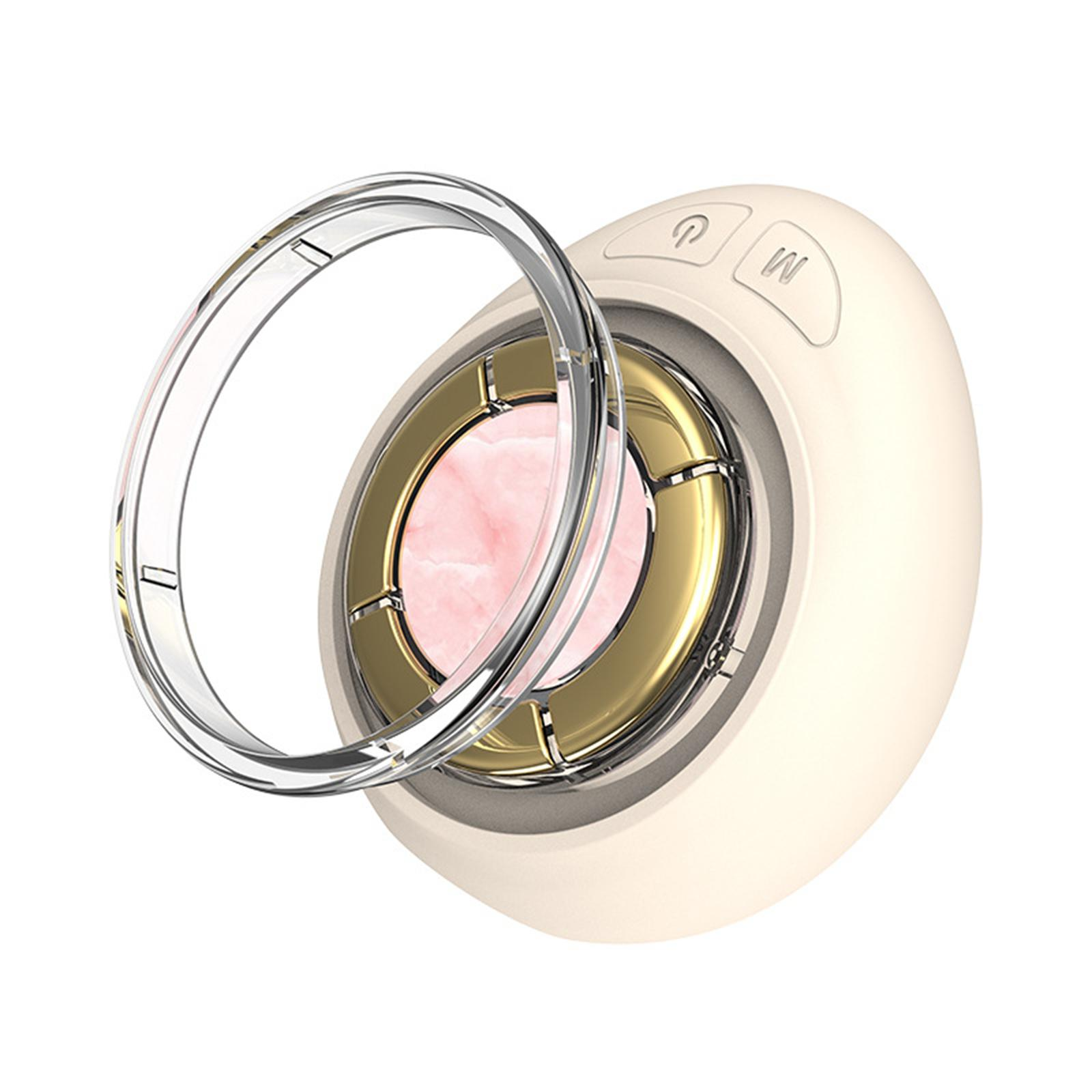 Weiß-goldenes Gesichtsgerät mit rosa Mitte. Ein transparenter Ring umgibt das Gerät.