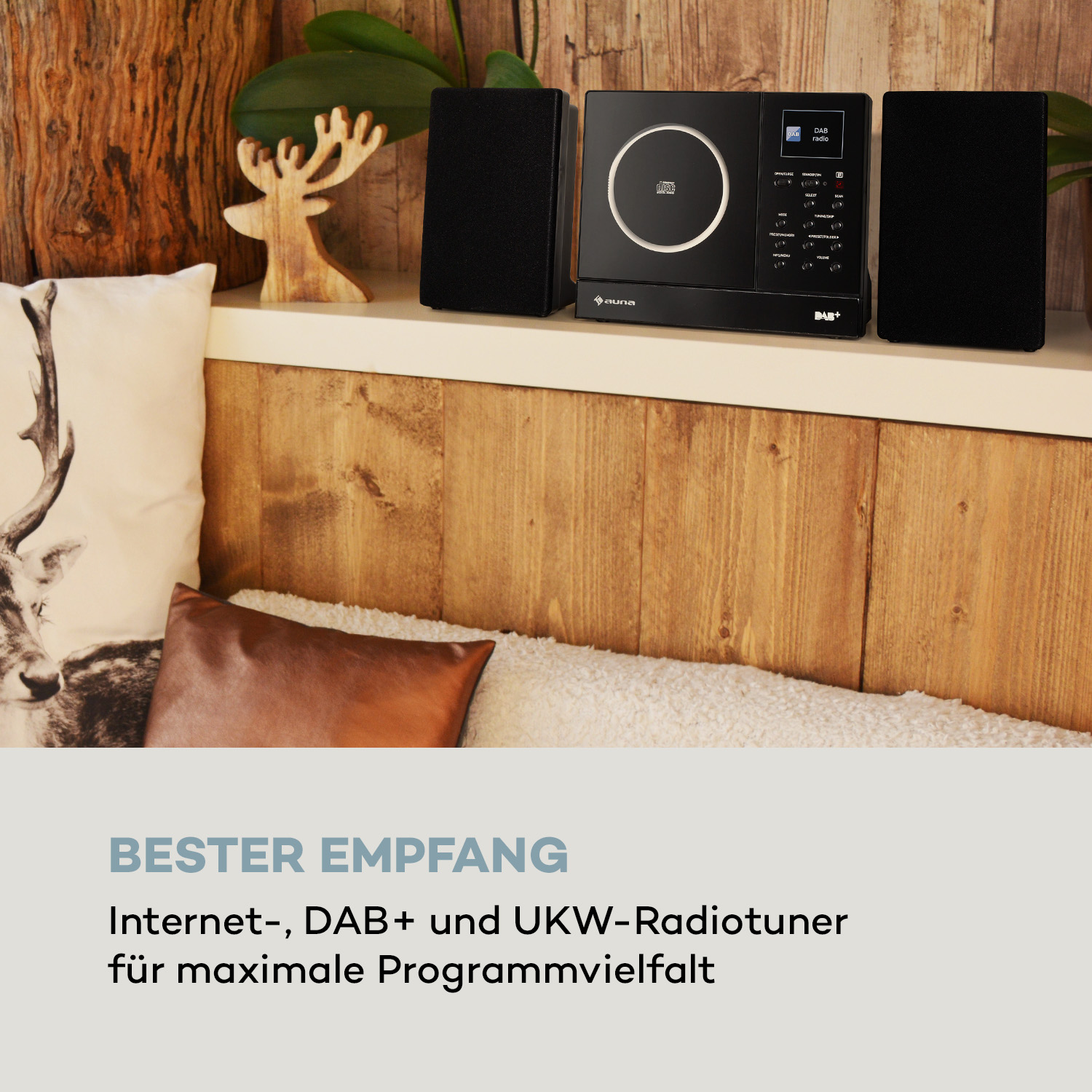 Ein schwarzes Stereoanlage mit Lautsprechern und Holz Hintergrund. Text: Bester Empfang.