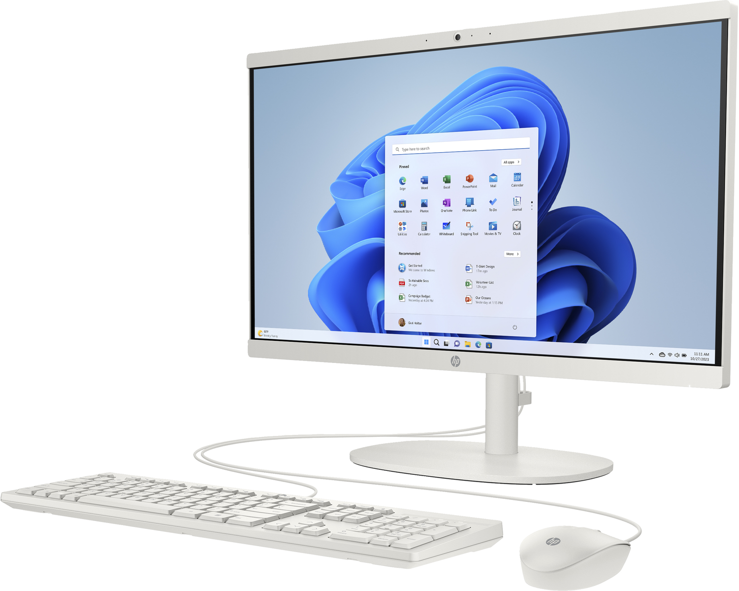 Un monitor di computer bianco con tastiera e mouse su una superficie bianca. Lo schermo mostra Windows 11.