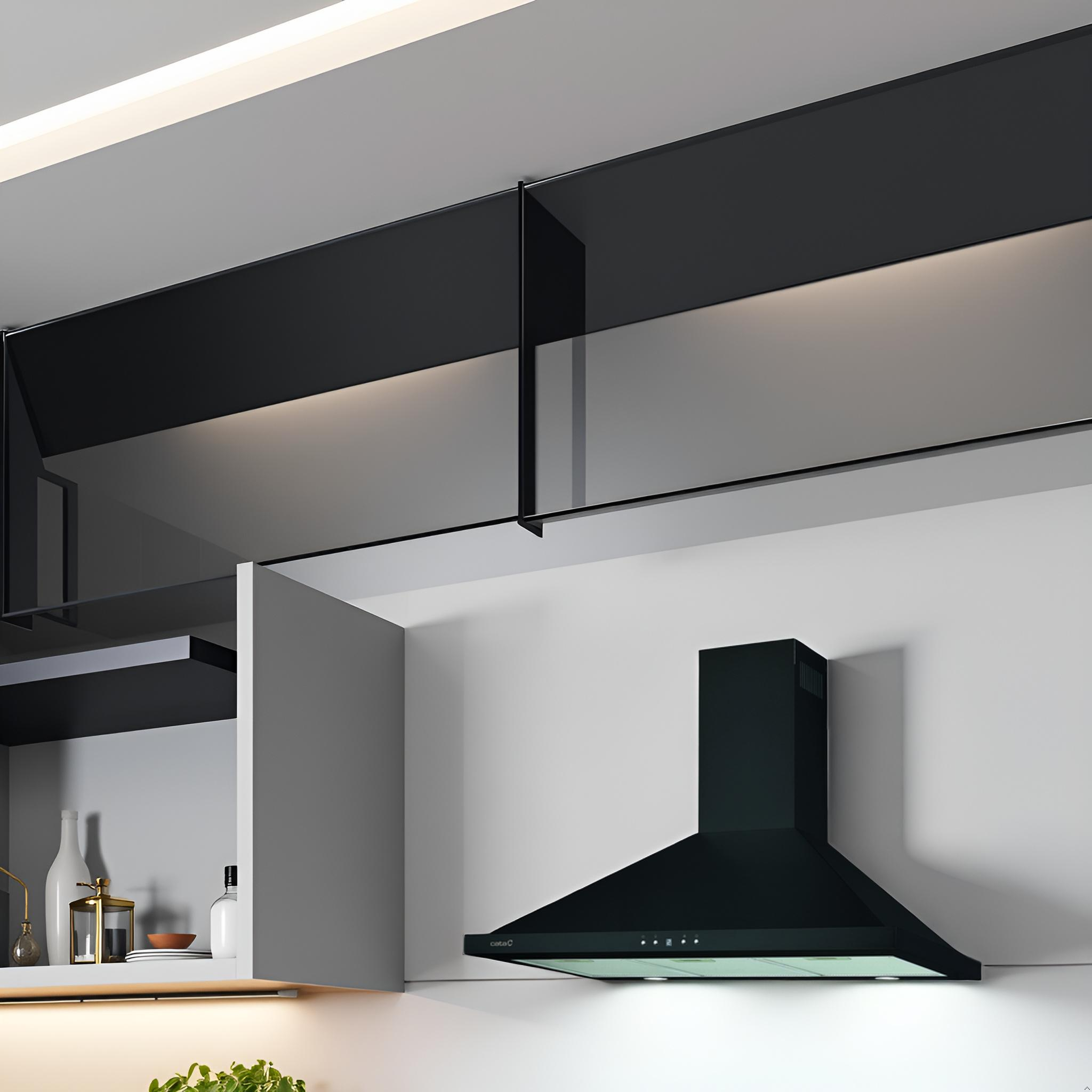 Cocina moderna con campana extractora negra. Armarios oscuros arriba. Pared y encimera blancas.