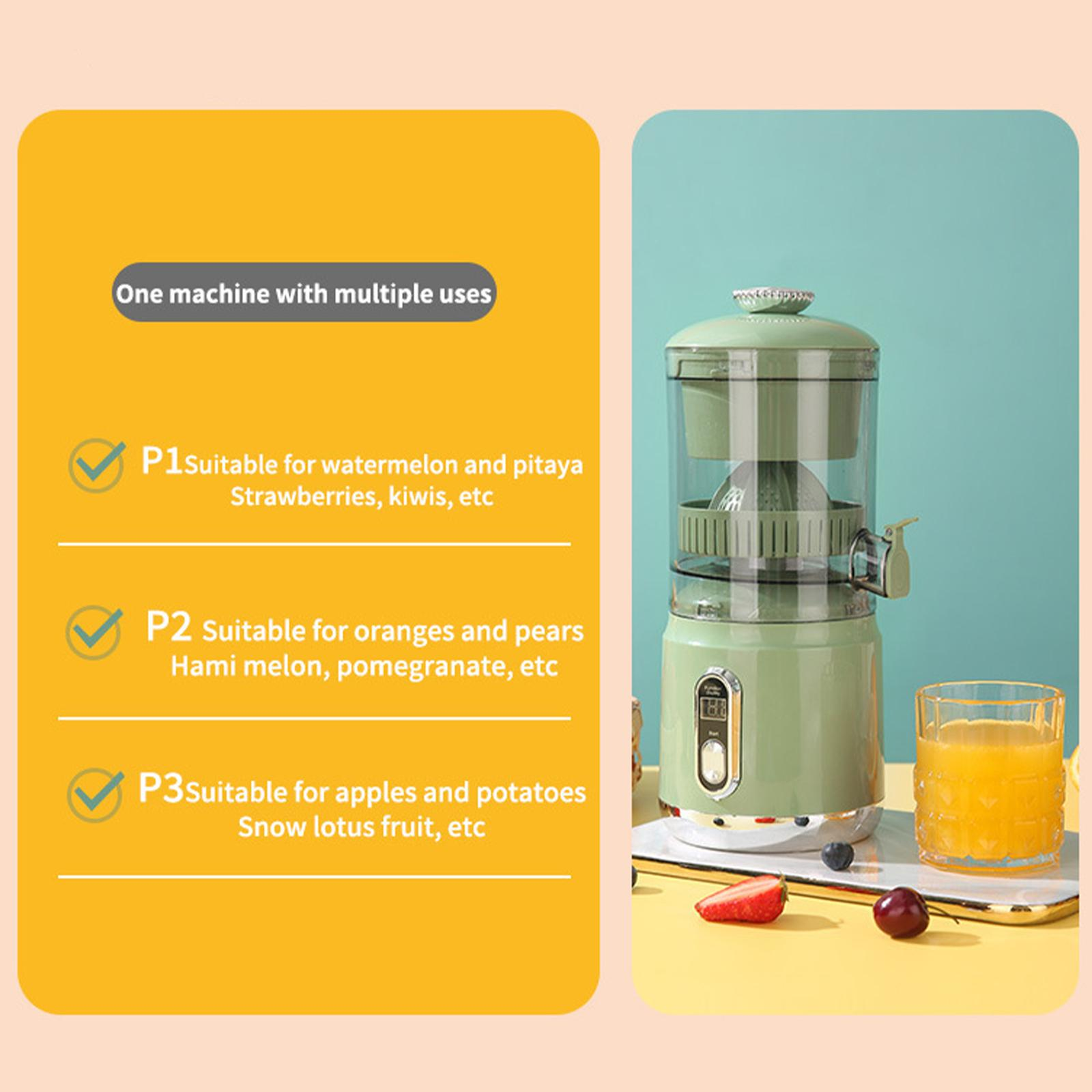Ein grüner und weißer Entsafter mit einem Glas Saft, einer Erdbeere und einer Kirsche.