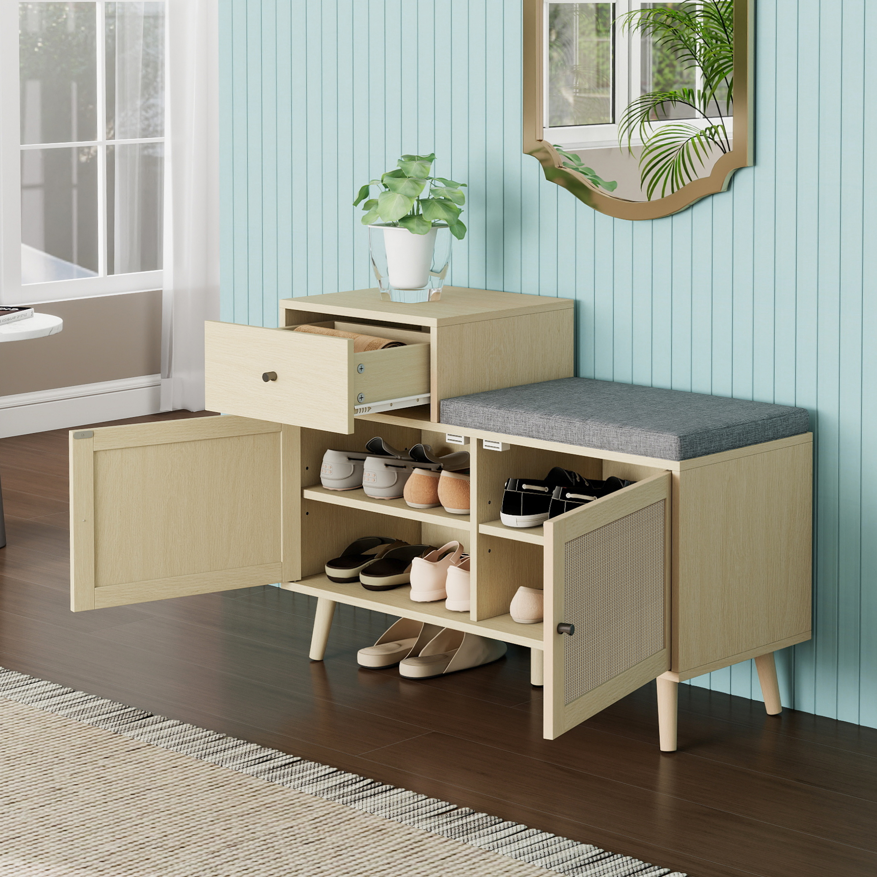 Schuhschrank aus Holz mit offener Schublade und Türen. Verschiedene Schuhe.