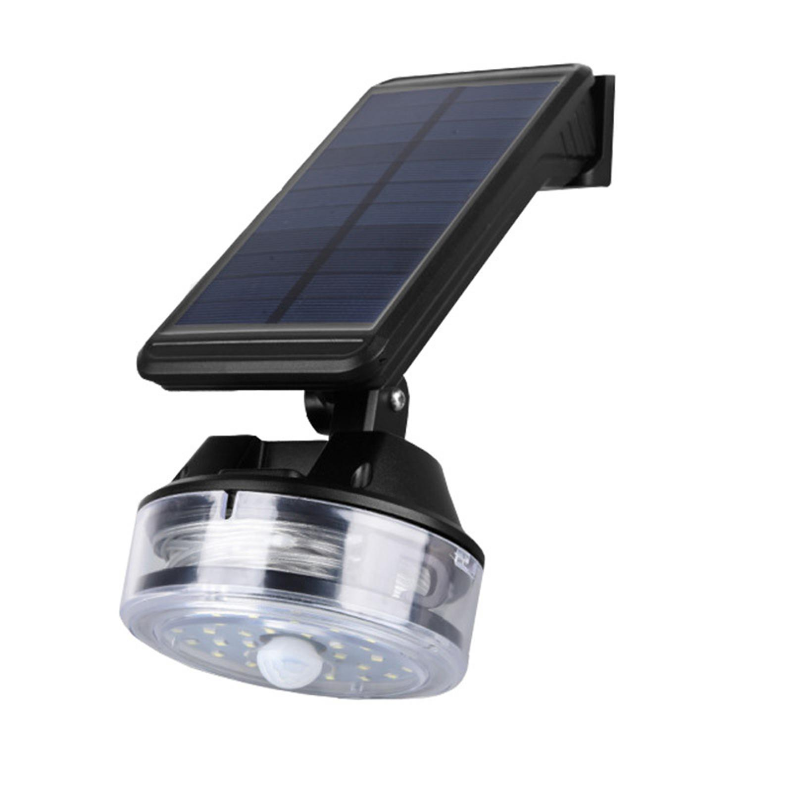 Schwarzes Solarpanel mit Lampe. Klare Abdeckung mit Lichtern und schwarze Basis. Weißer Hintergrund.