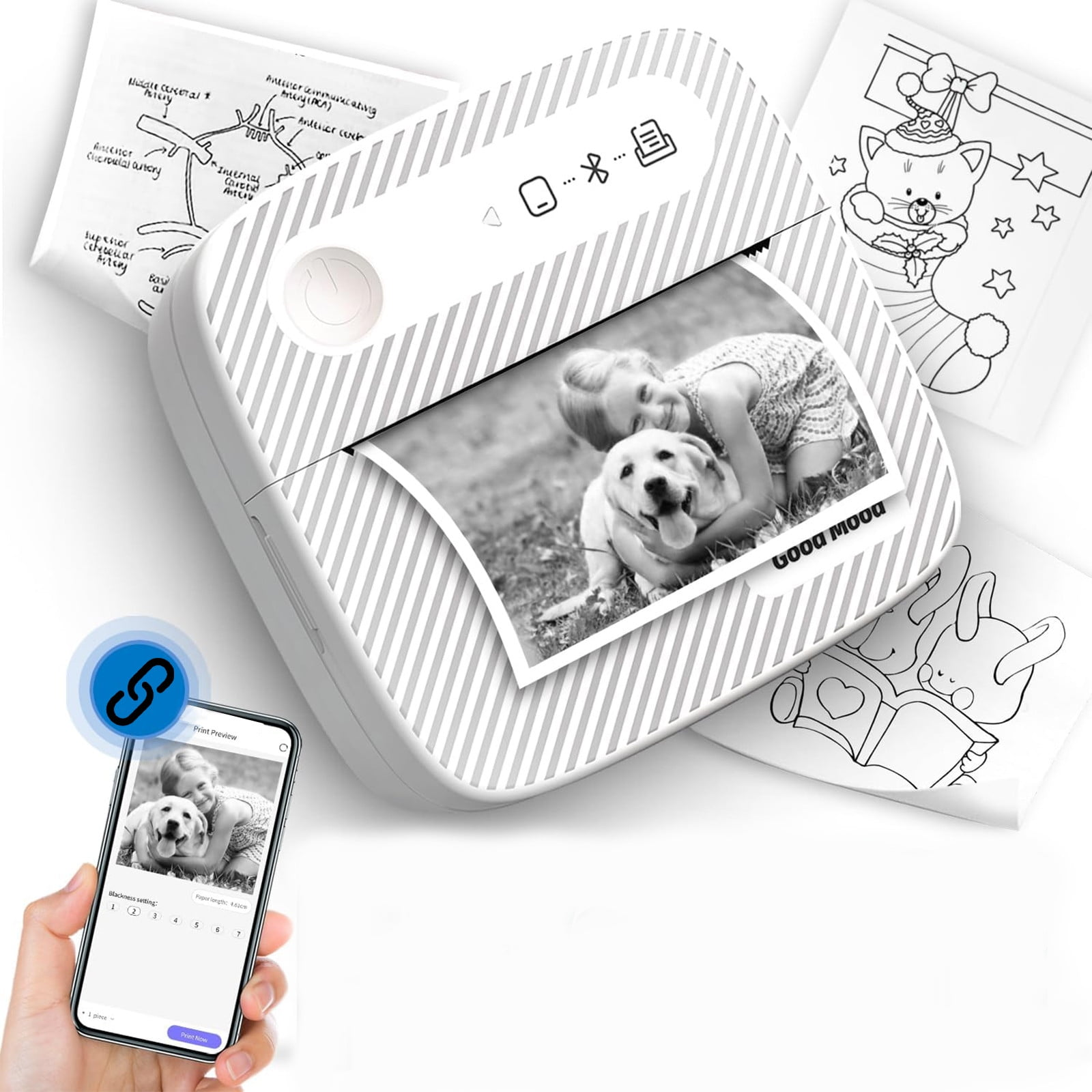 Ein tragbarer Drucker druckt ein Foto von einem Mädchen mit einem Hund. Ein Smartphone zeigt ein Foto. Malvorlagen sind im Hintergrund.