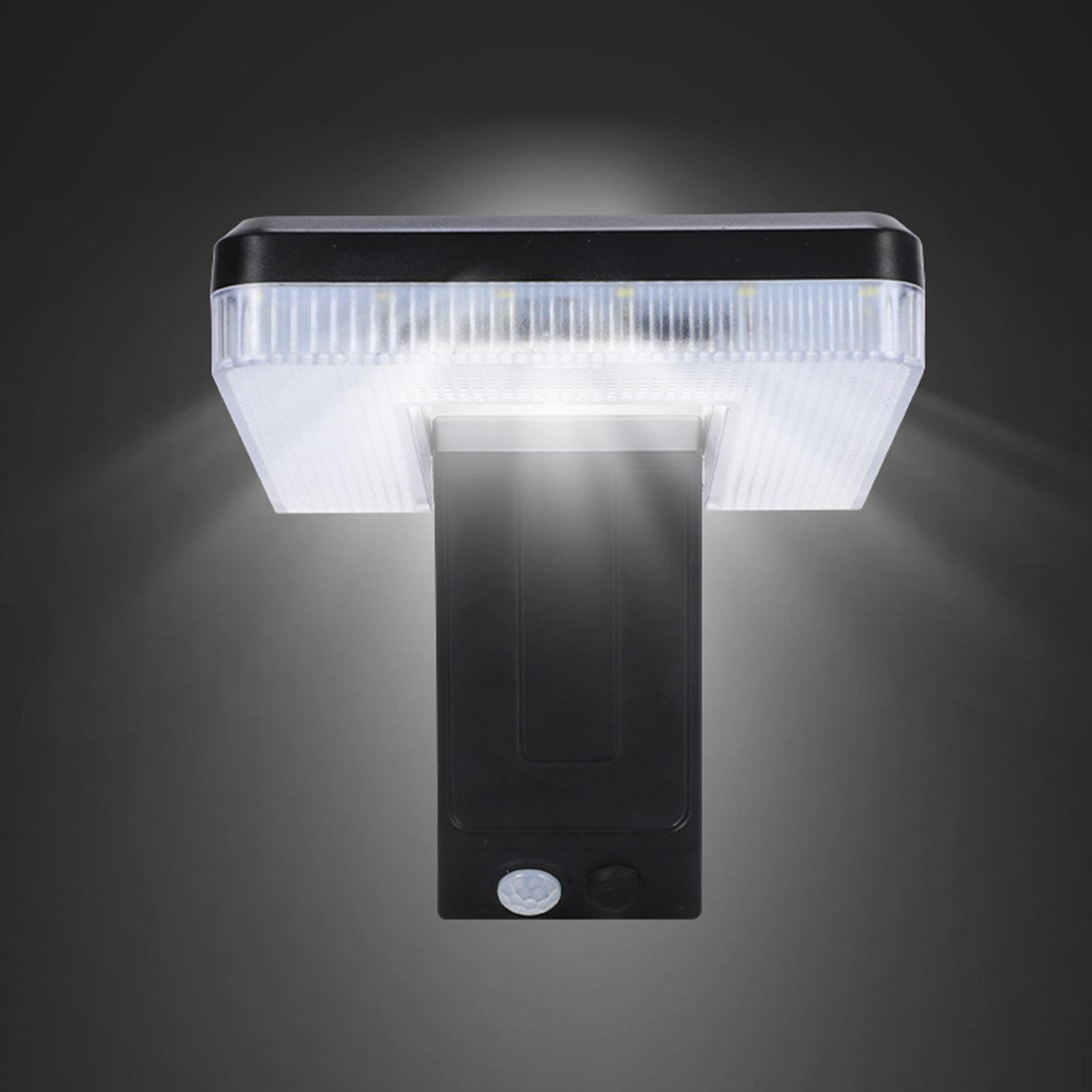 Solarbetriebene Außenleuchte, schwarzes Gehäuse mit hellem weißen LED-Panel oben.