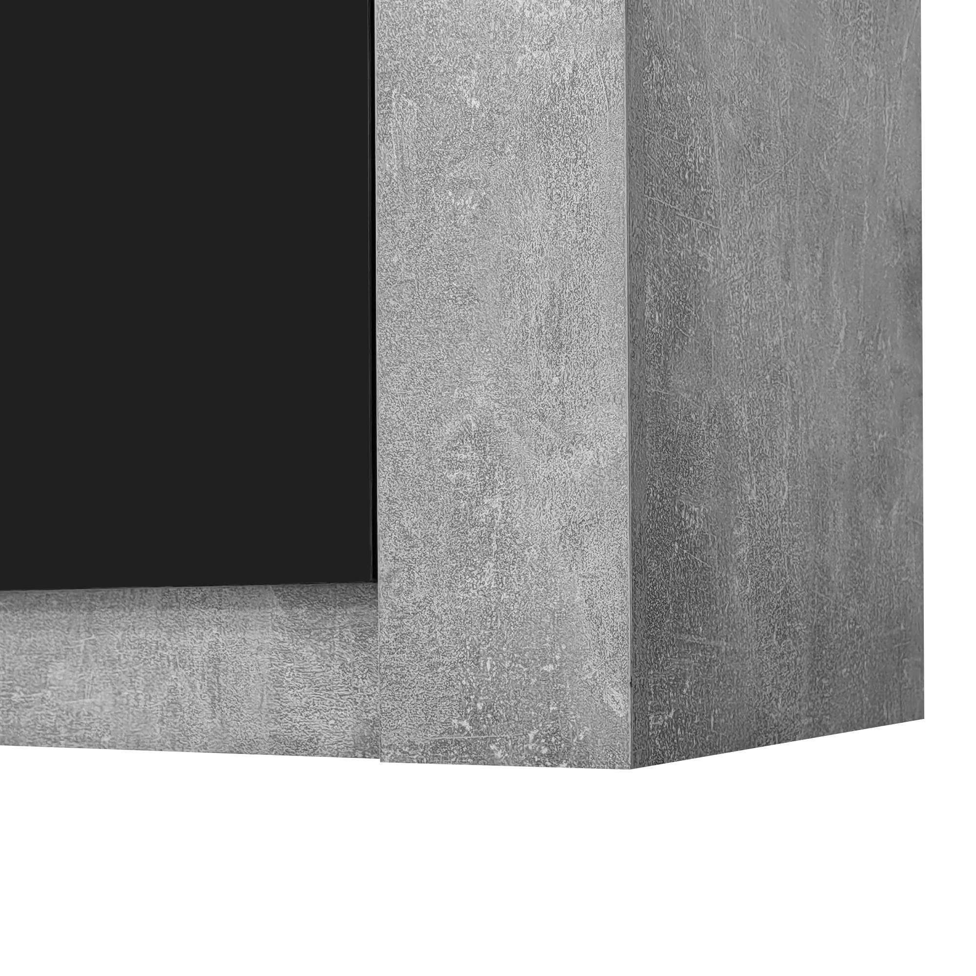 Nahaufnahme eines grauen Betonblocks. Die Ecke ist sichtbar.