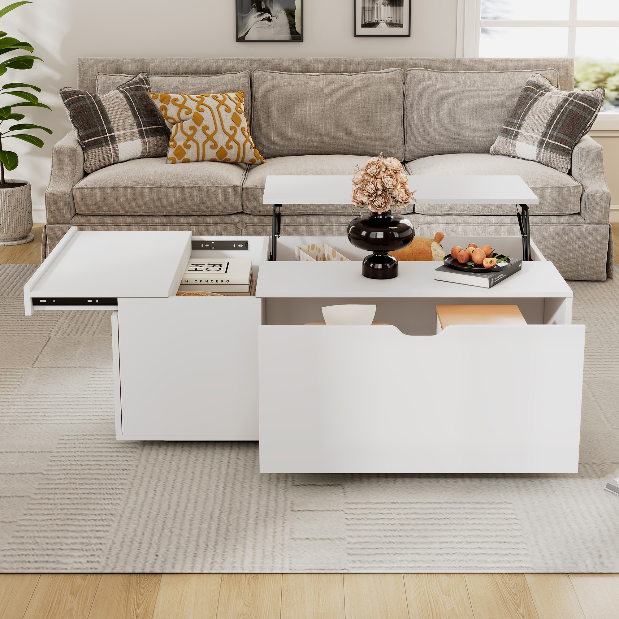 Weißer Couchtisch mit Hubtisch und offenen Schubladen in einem Wohnzimmer.
