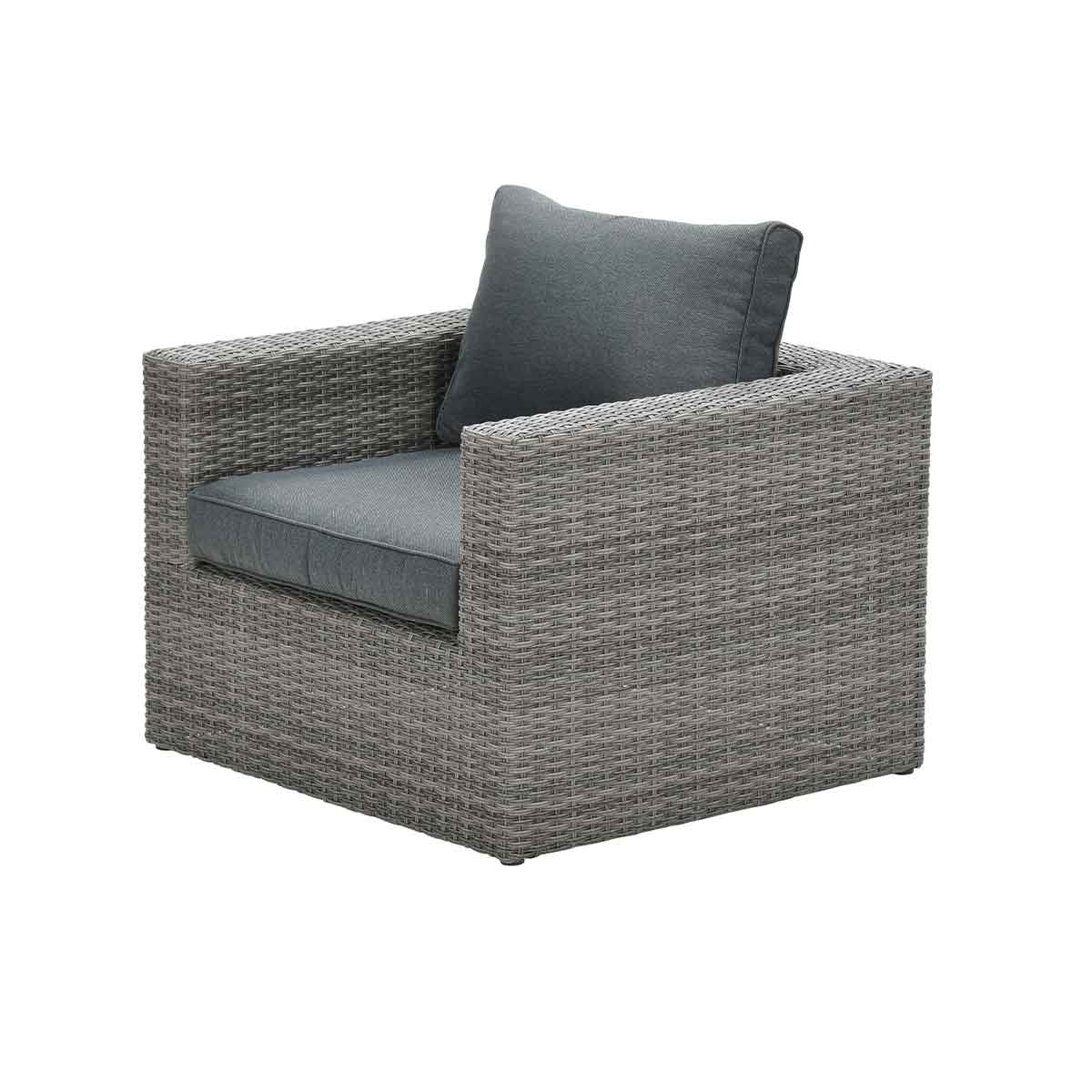 A grey wicker outdoor armchair with a cushion.