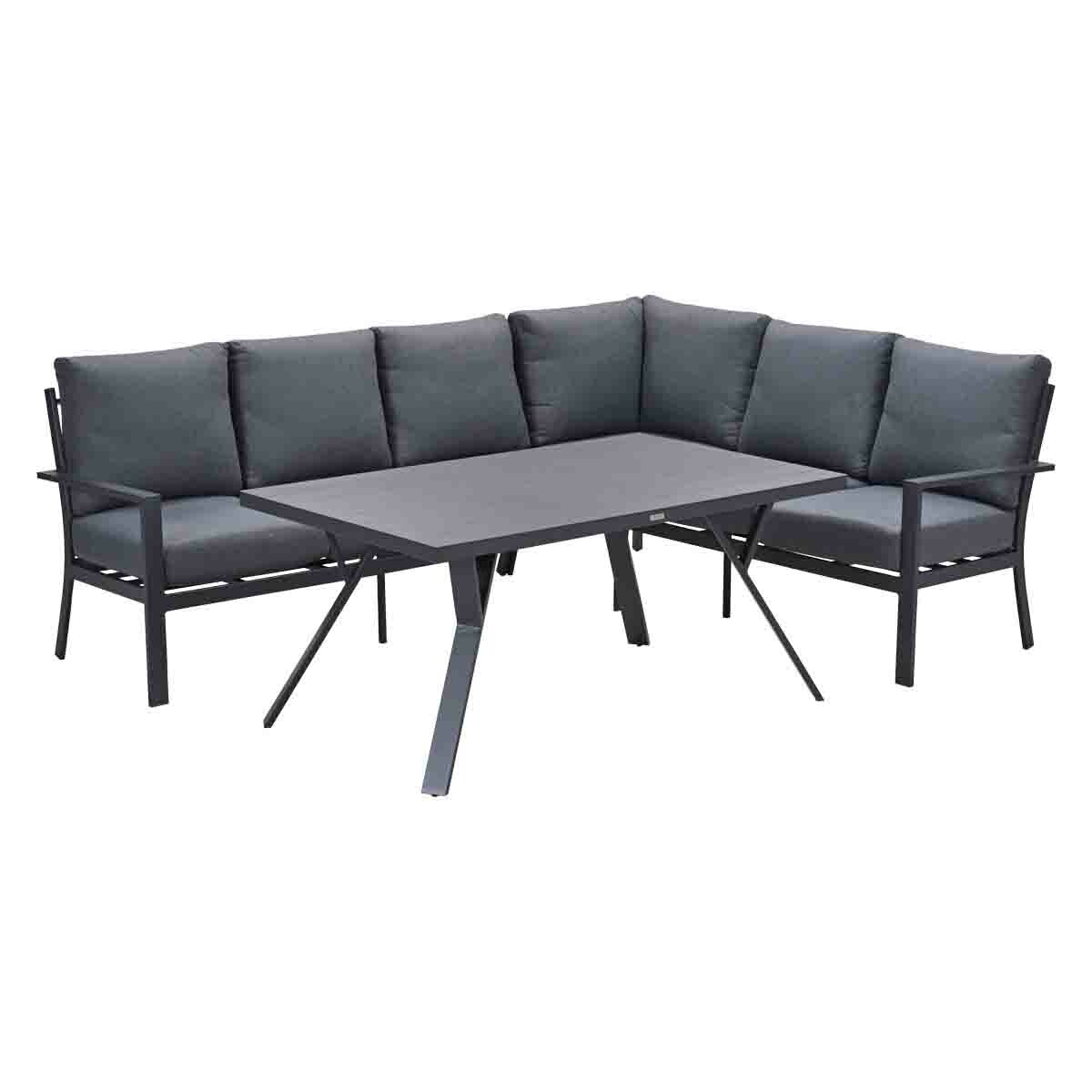 Un canapé d'extérieur gris foncé avec une table.