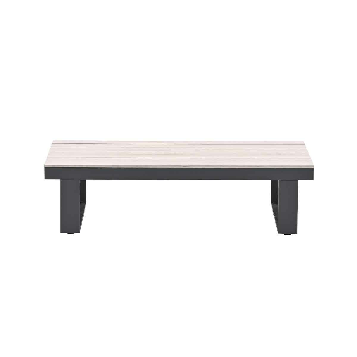 A rectangular coffee table with a light wood top and a black frame. It is a modern design.