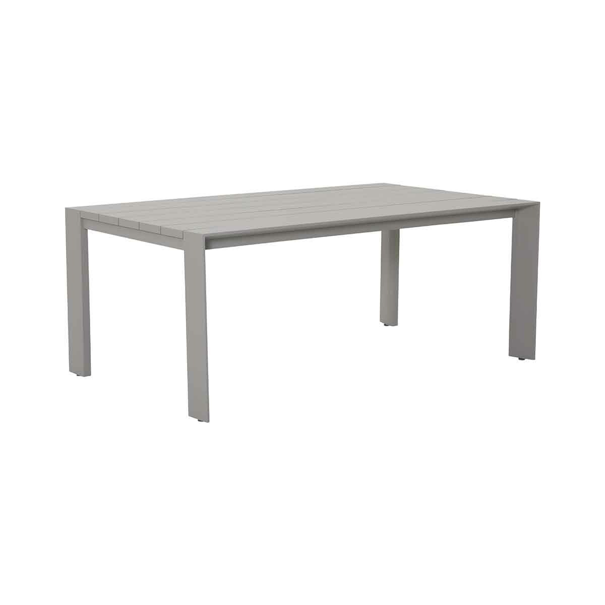 A gray rectangular outdoor table with four legs on a white background.