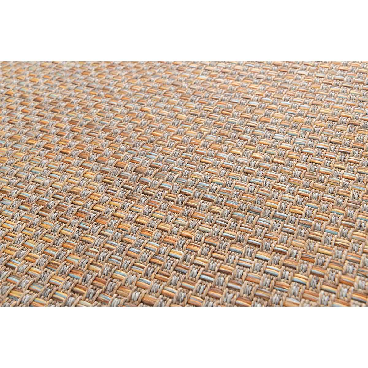 Close-up van geweven vloerkleed, met textuur en details.
