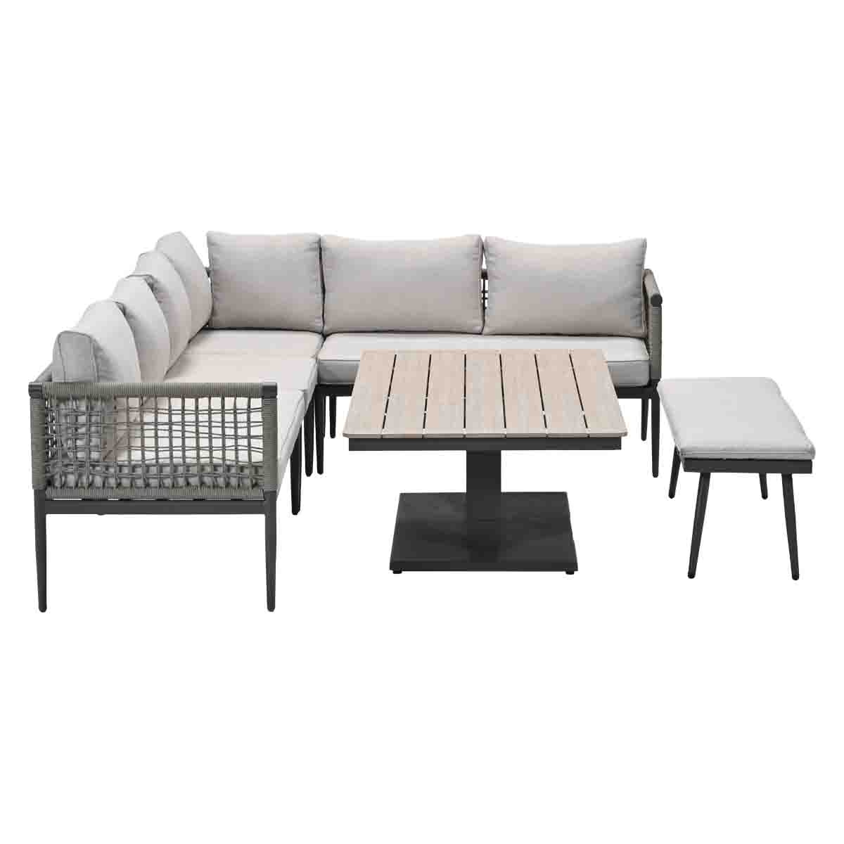 Canapé d'angle extérieur, table et banc. Coussins gris clair, plateau en bois, cadre noir. Fond blanc.