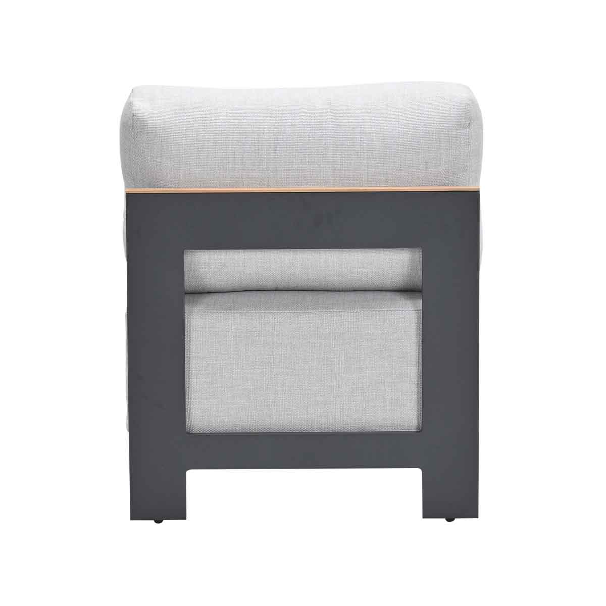 A gray outdoor bench with a cushioned seat and backrest, isolated.
