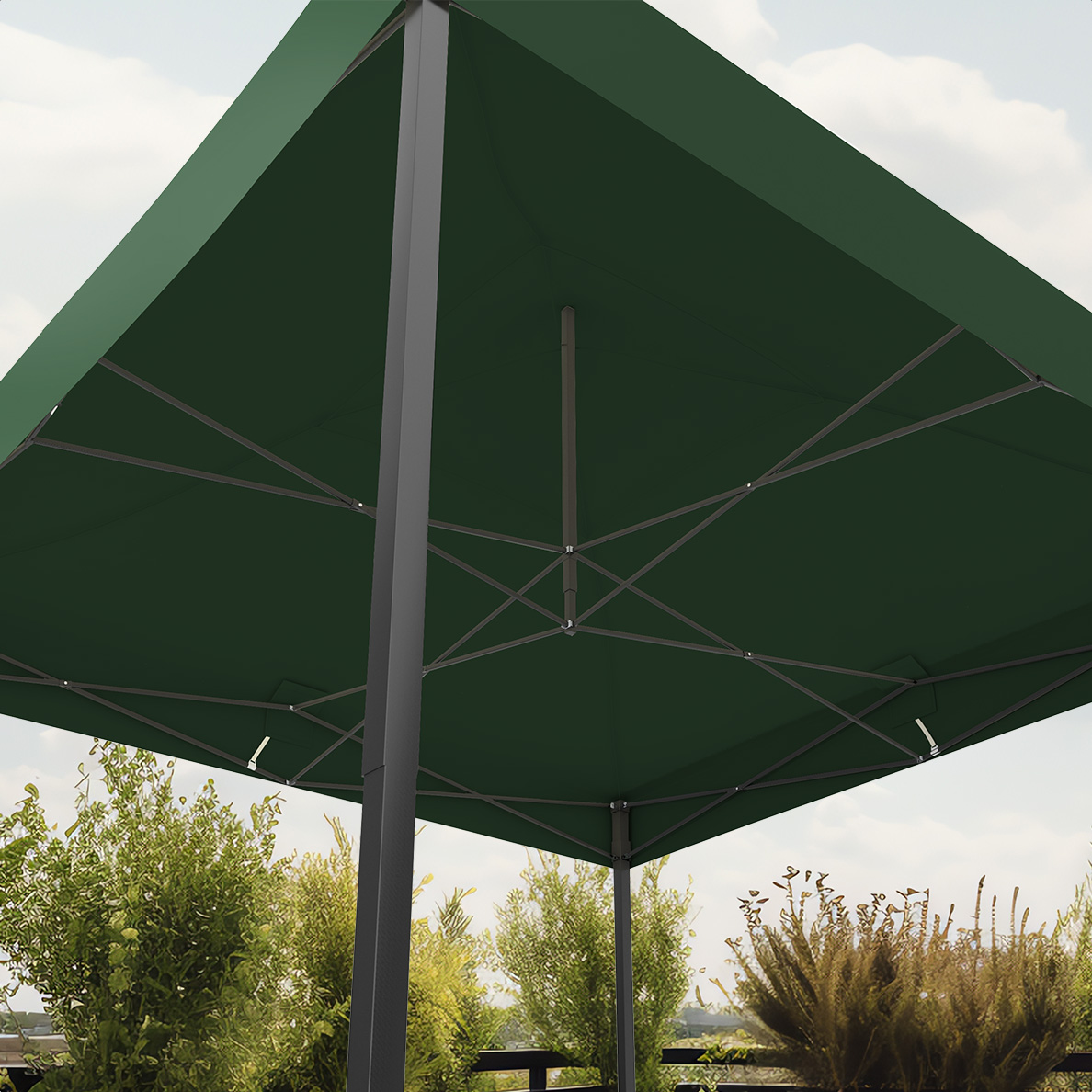Green square outdoor umbrella with metal frame, seen from below, with plants and blue sky.