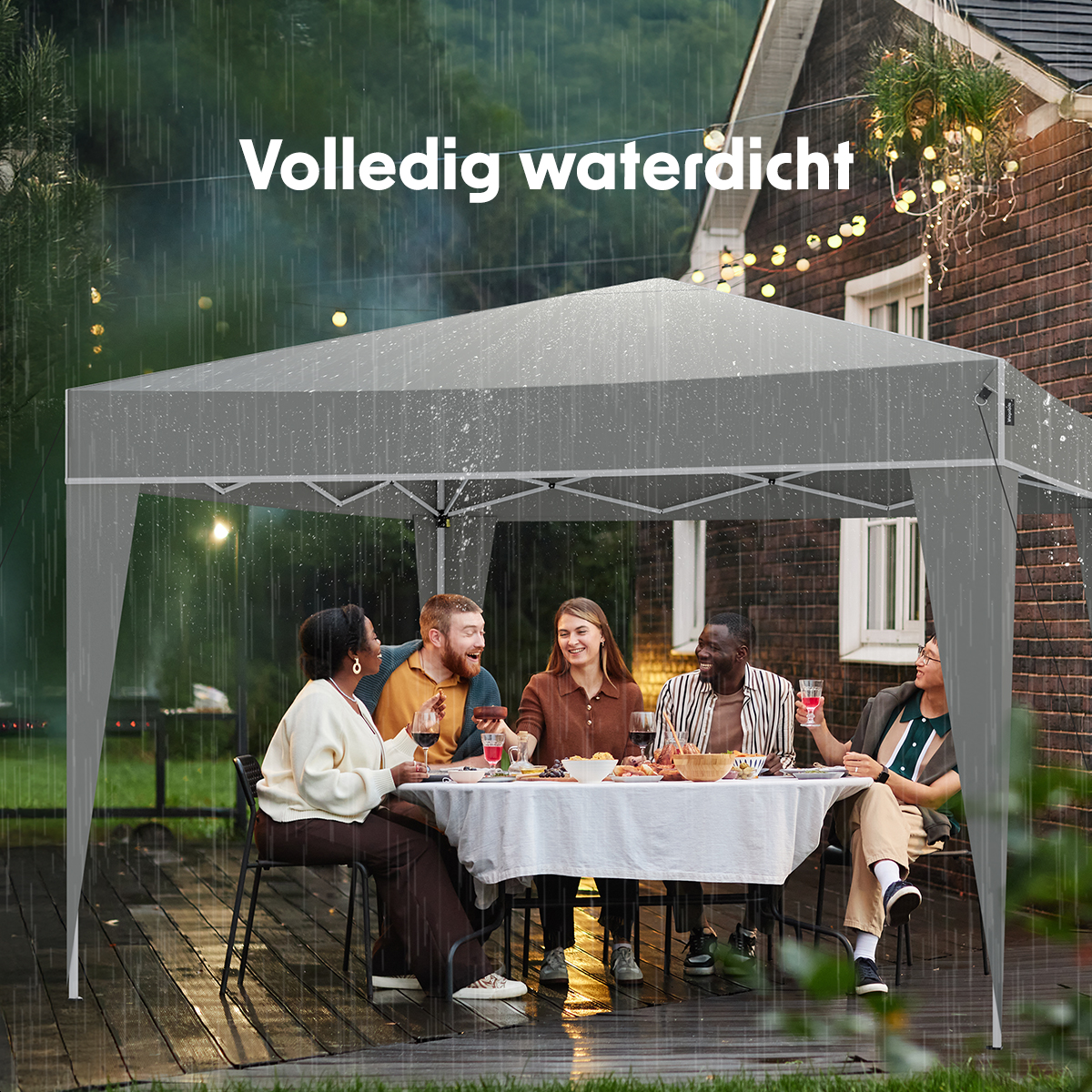 People seated at a table under a grey gazebo in the rain. It's fully waterproof.