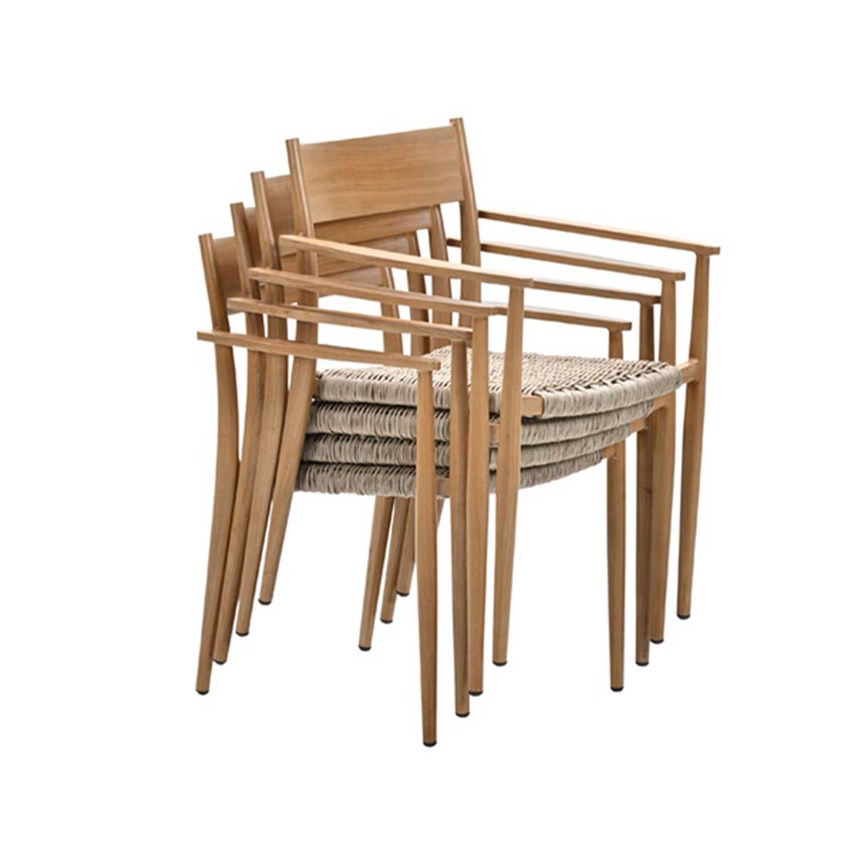 Stacked wooden chairs with woven seats, seen against a white background.