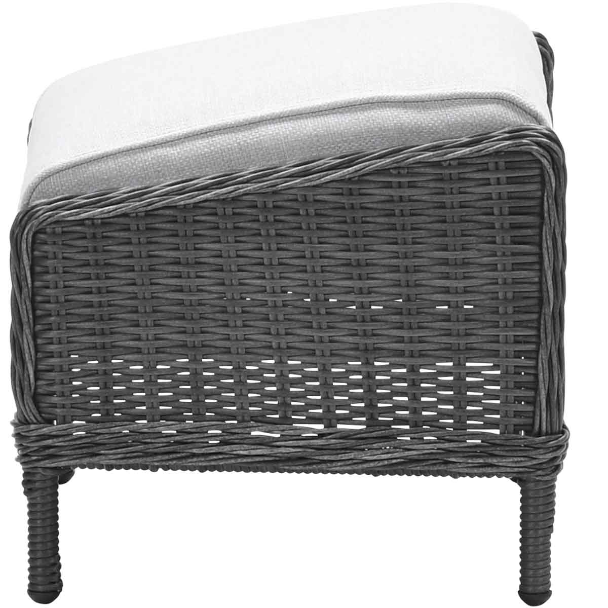 Wicker footstool with a light cushion, on a white background.