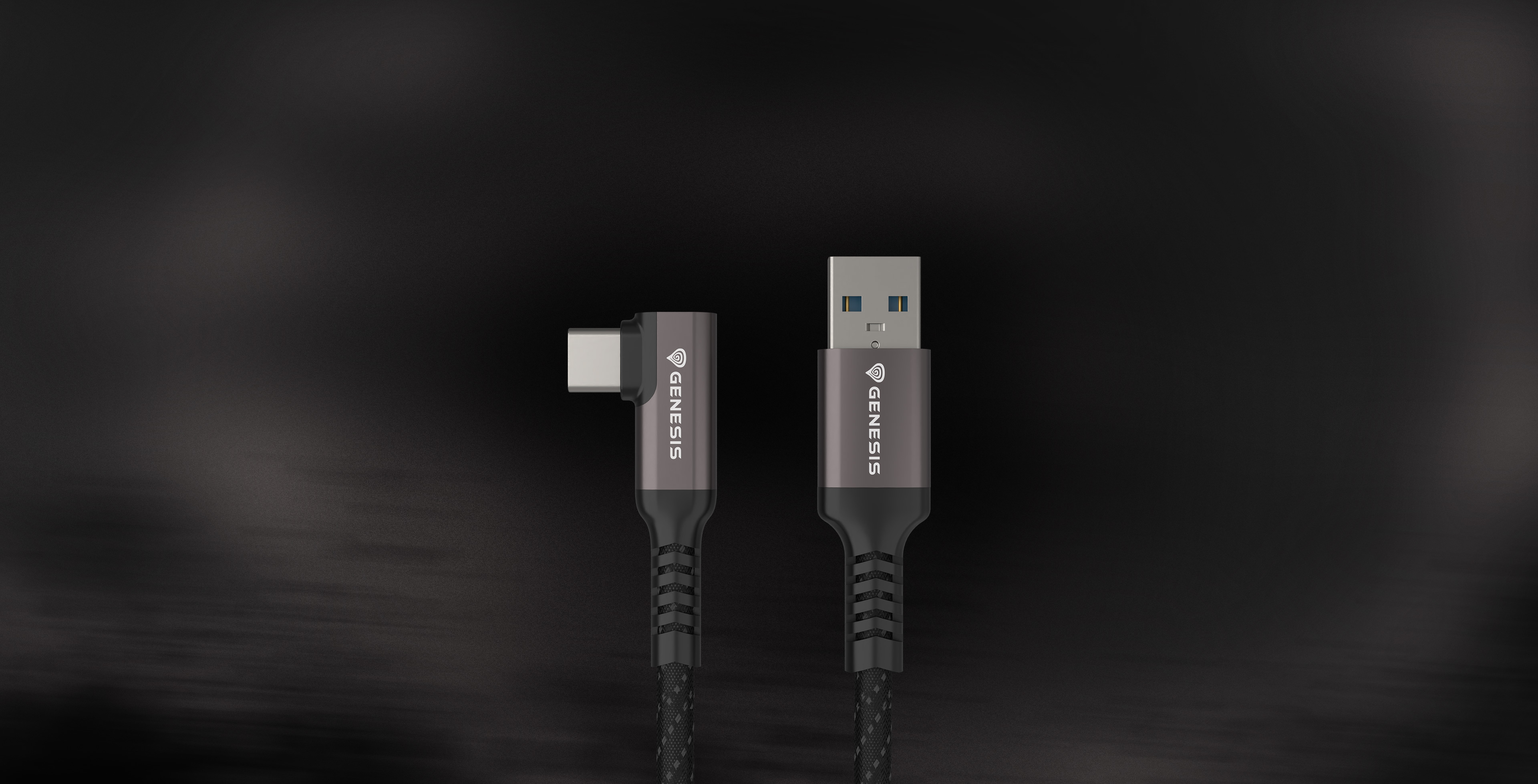 Czarny i szary kabel USB do USB-C z marką GENESIS. Tło jest ciemne.