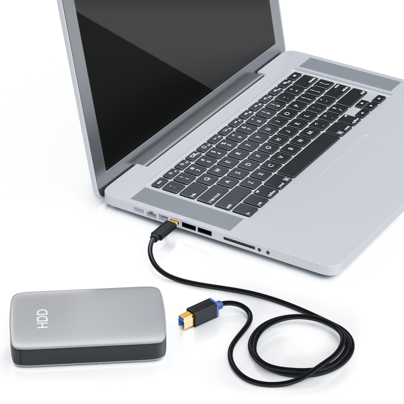 Laptop über ein schwarzes Kabel mit einer Festplatte verbunden; weißer Hintergrund.