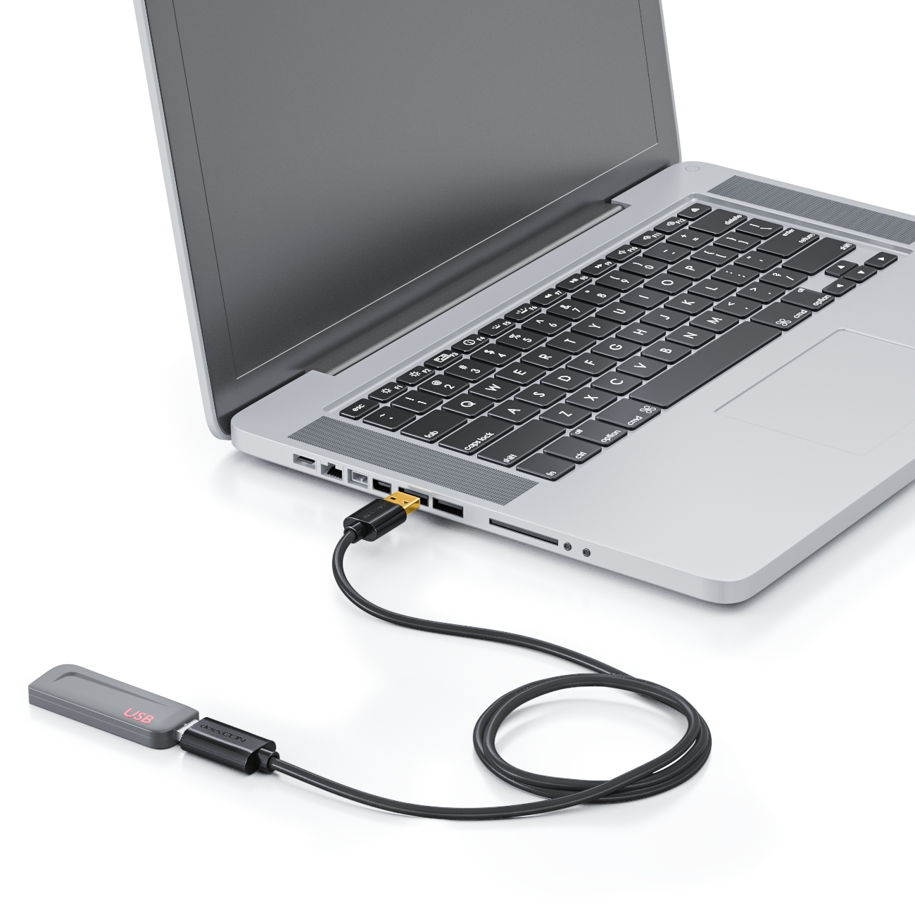 Ein Laptop ist über ein schwarzes Kabel mit einem grauen USB-Gerät verbunden. Das USB-Gerät hat einen USB-Anschluss.