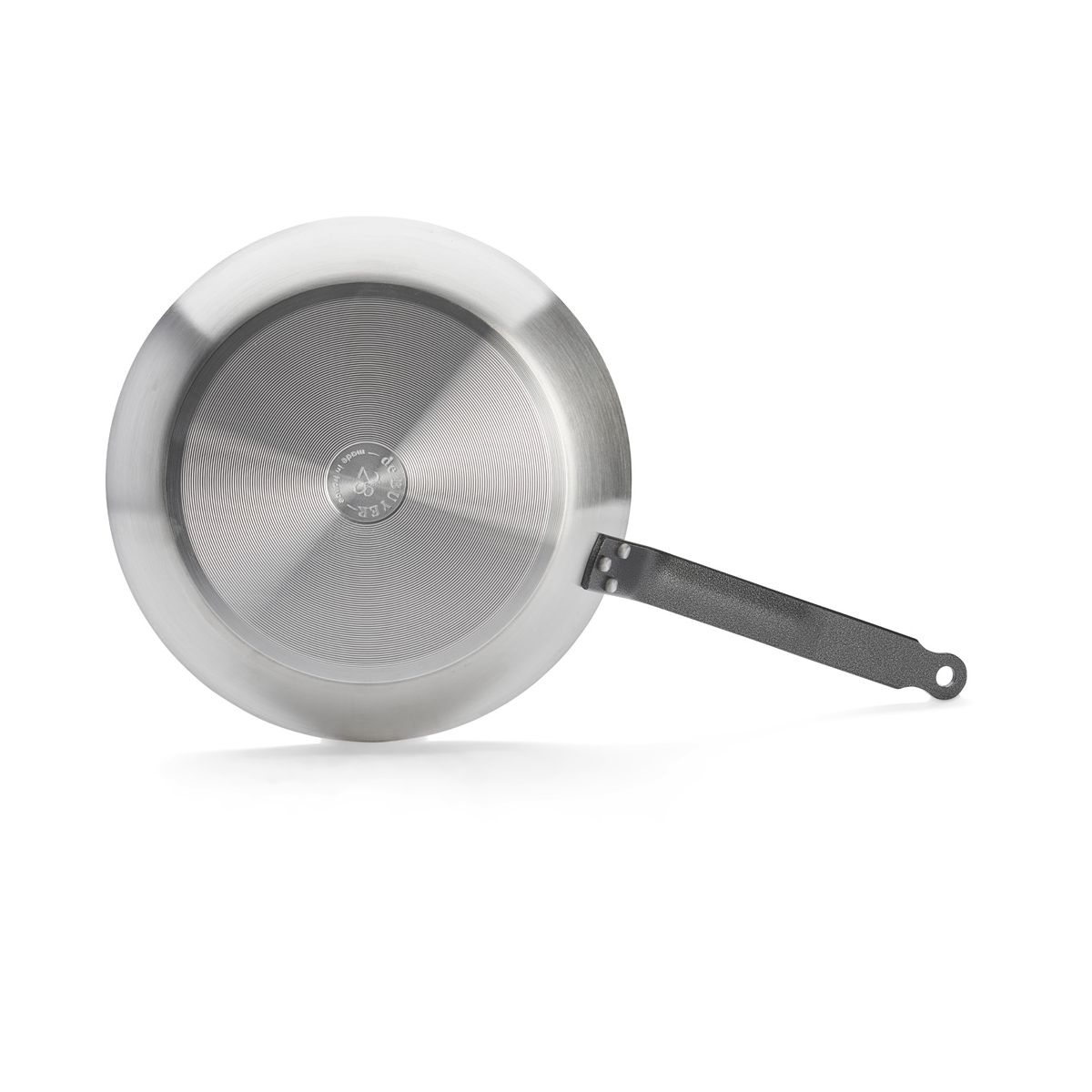 Frying pan bottom, with silver details and a black handle, placed on a white background.