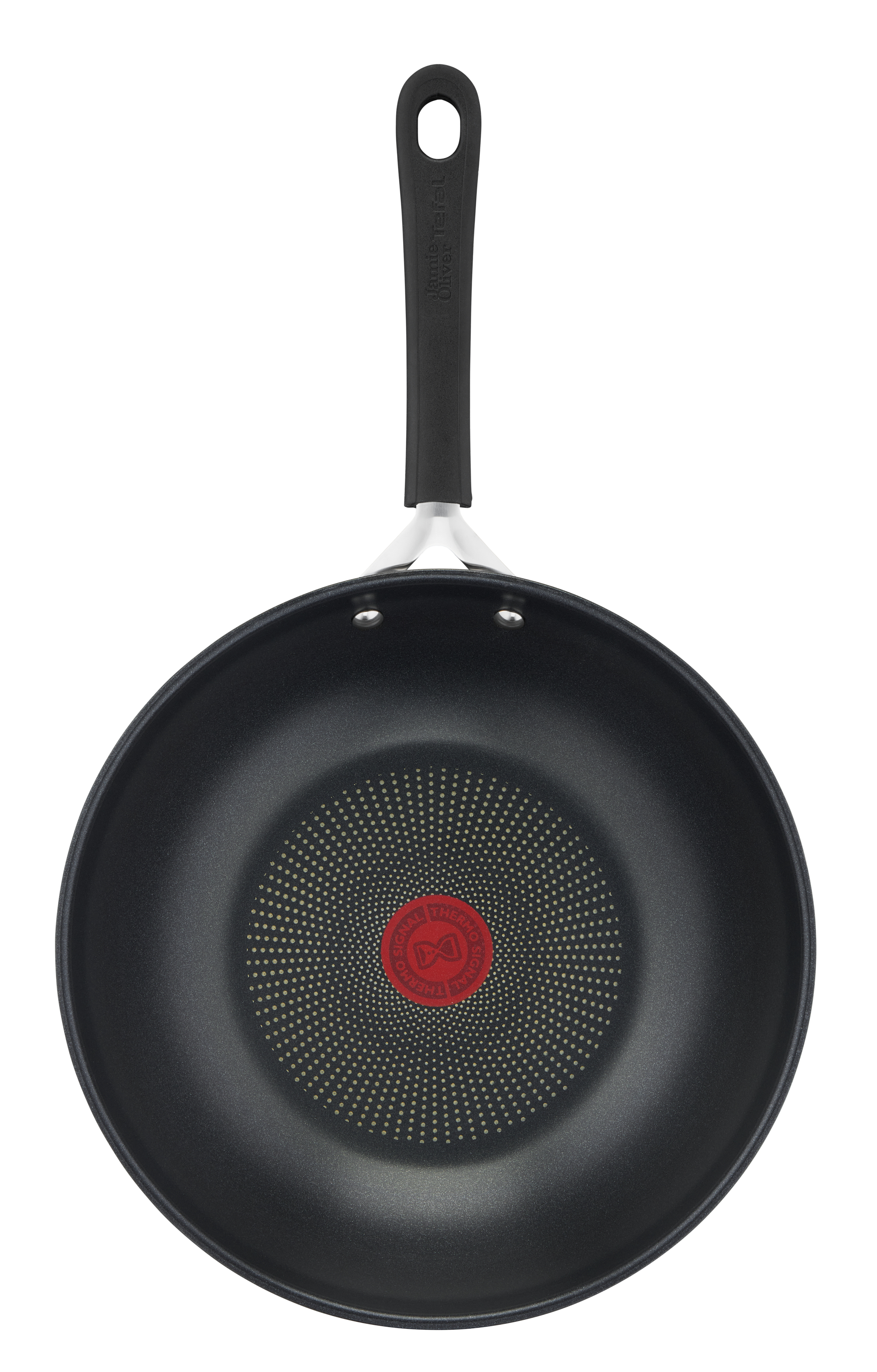 Czarny wok z czarnym uchwytem na białym tle. Wnętrze jest czarne.