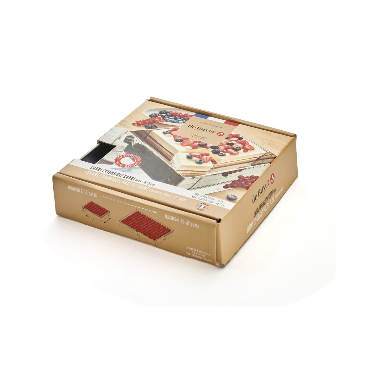 Kartonowe pudełko ze zdjęciem ciasta i jagód. Na pudełku napis: „regulowana kwadratowa ramka do ciasta”.