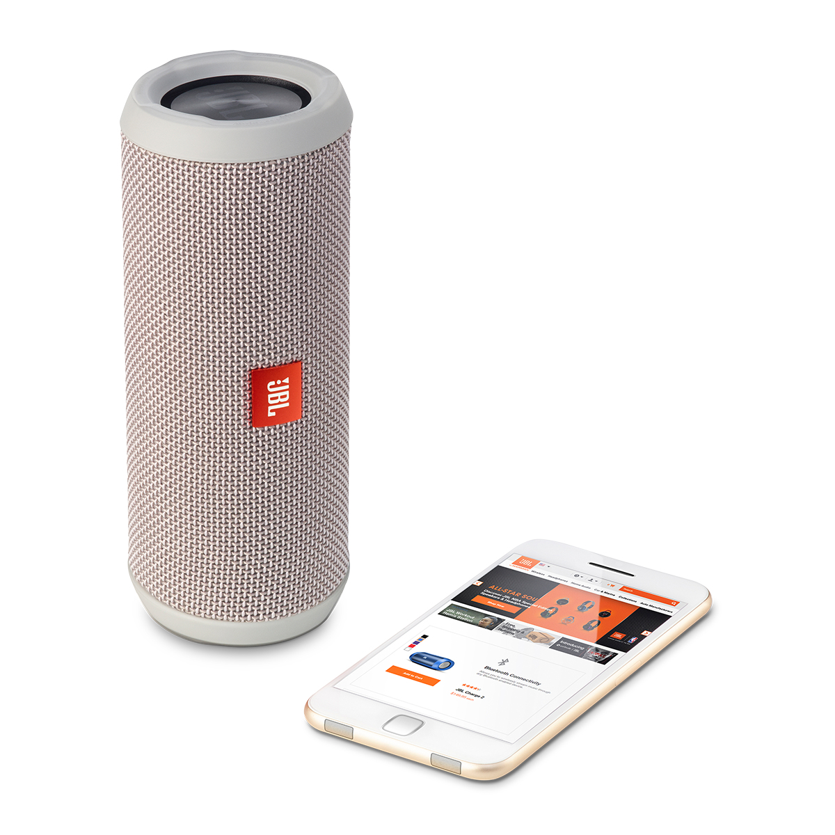 JBL-Lautsprecher neben einem Telefon, das eine Website über JBL-Produkte zeigt.