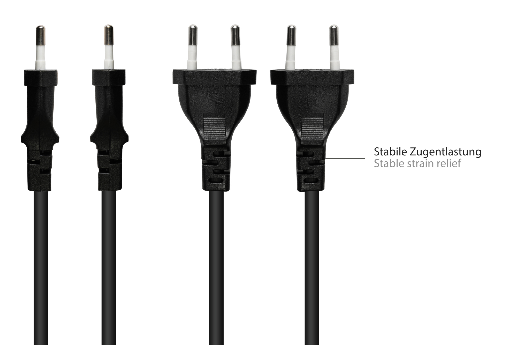 Trzy czarne wtyczki z dwoma bolcami. Środkowa wtyczka ma etykietę.