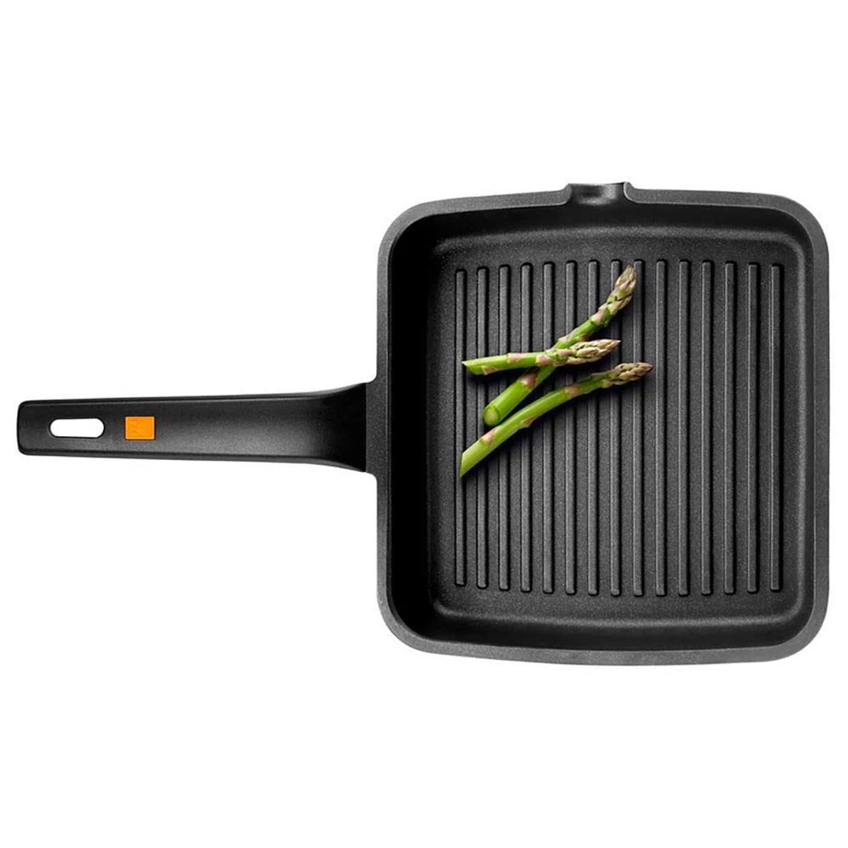 Sartén de parrilla negra con tres espárragos. La sartén tiene estrías y un mango negro con detalle naranja.